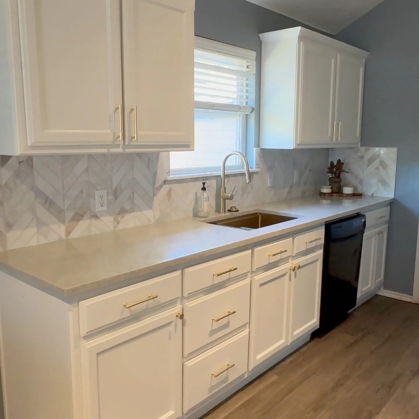 Our recent kitchen remodel for a family in Yukon.

 This family suffered from significant flood damage from a water heater leak that ruined their floors, base kitchen cabinetry and living room floor area with drywall. Needless to say, they were in ne