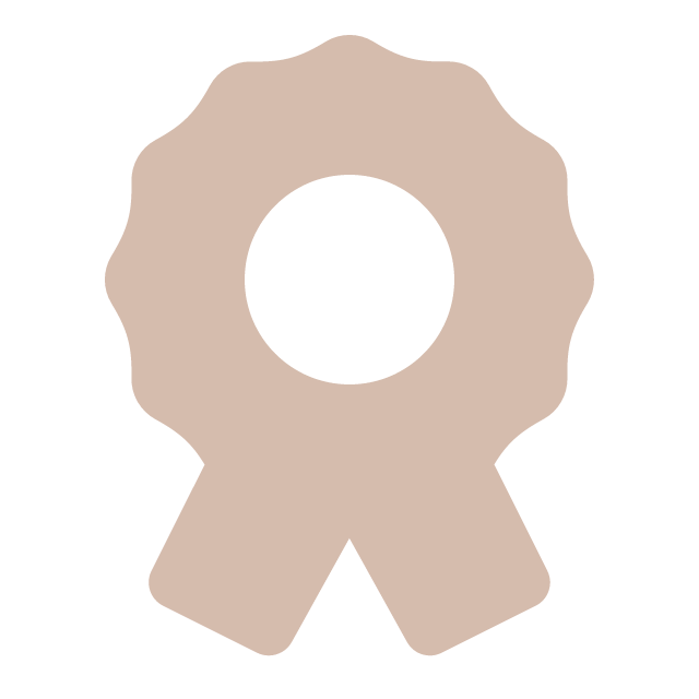 Icon of a beige ribbon with a circular top and two tails at the bottom.