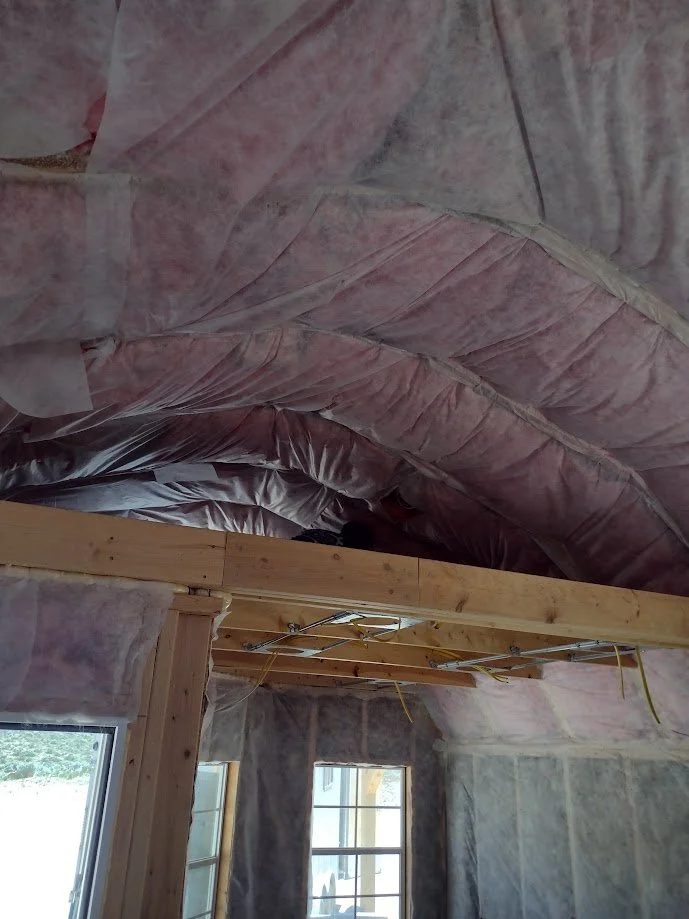 photograph of a loft area that has been insulated