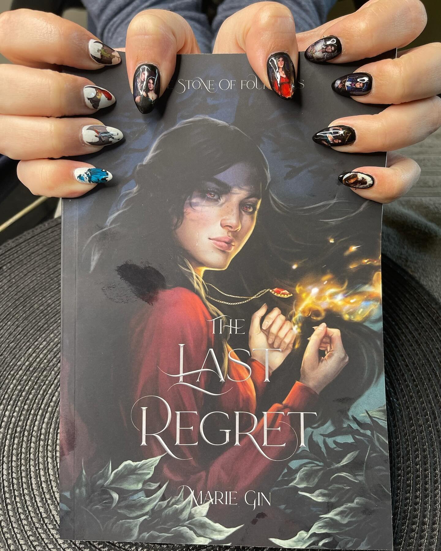 When you love their art so much, you get nails done with it 💅🏻 @jengrayart @sashac_art made my characters come alive ❤️ #thelastregret #thelastremorse #thestoneoffourfires #darkfantasy #booktok #bookstagram