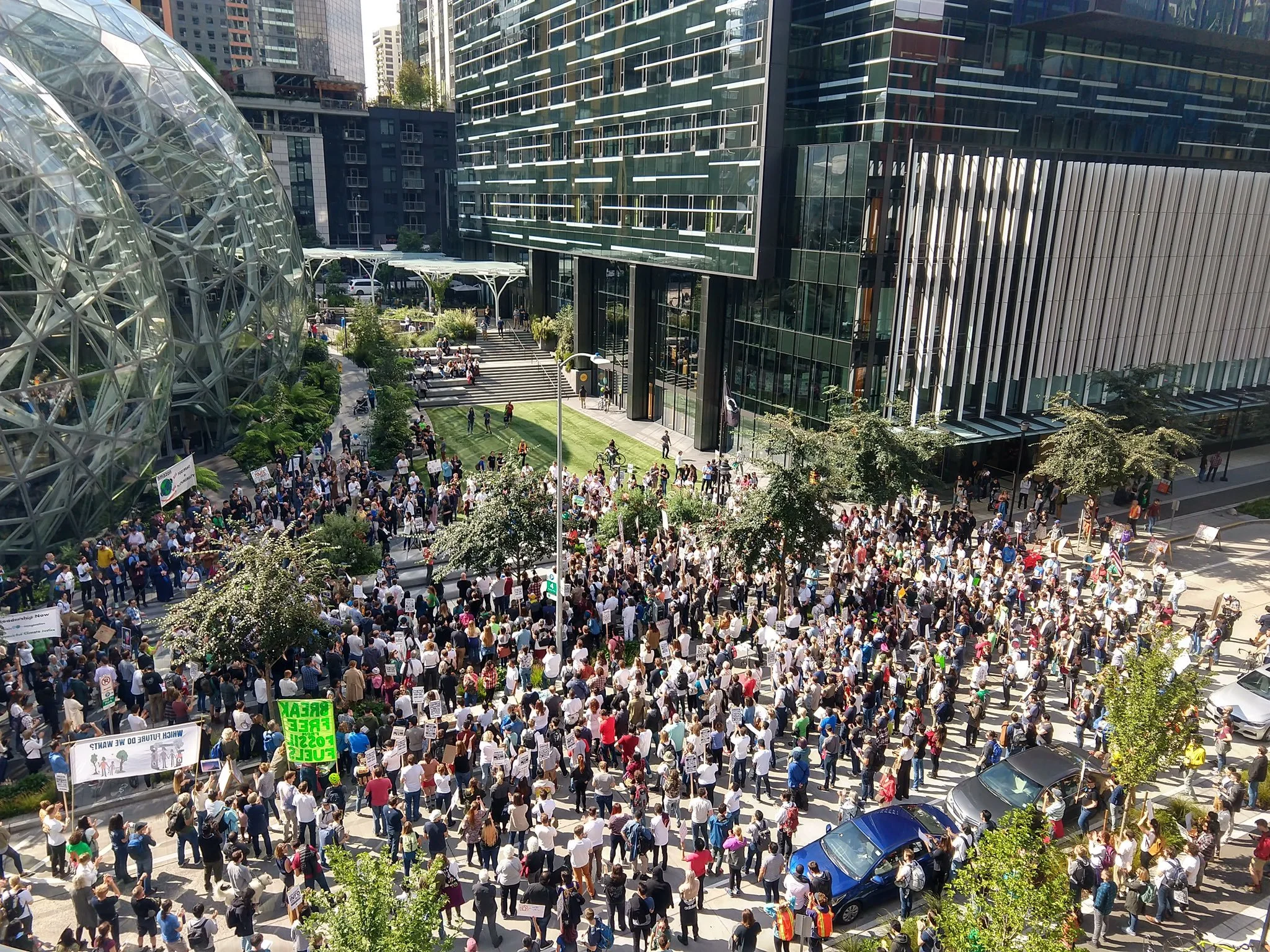 Aerial photos of employees organized outside the Amazon Spheres