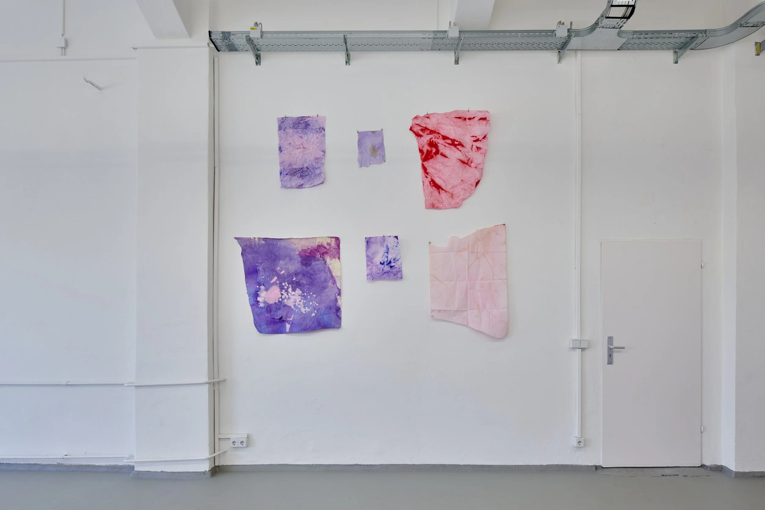 Frontal installation view of colourful works by Marie Birkedal in Godspeed / Savage Glitter.
