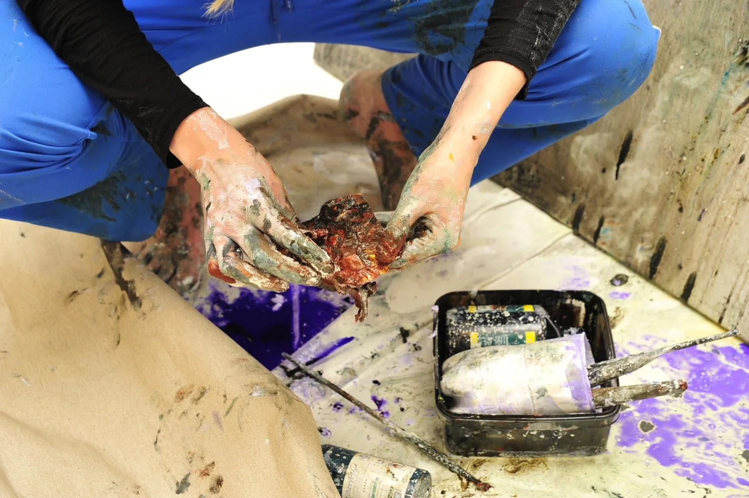 Marie Birkedal studio process, 2016, the artist working directly with paint and pigment by hand in her Berlin studio.