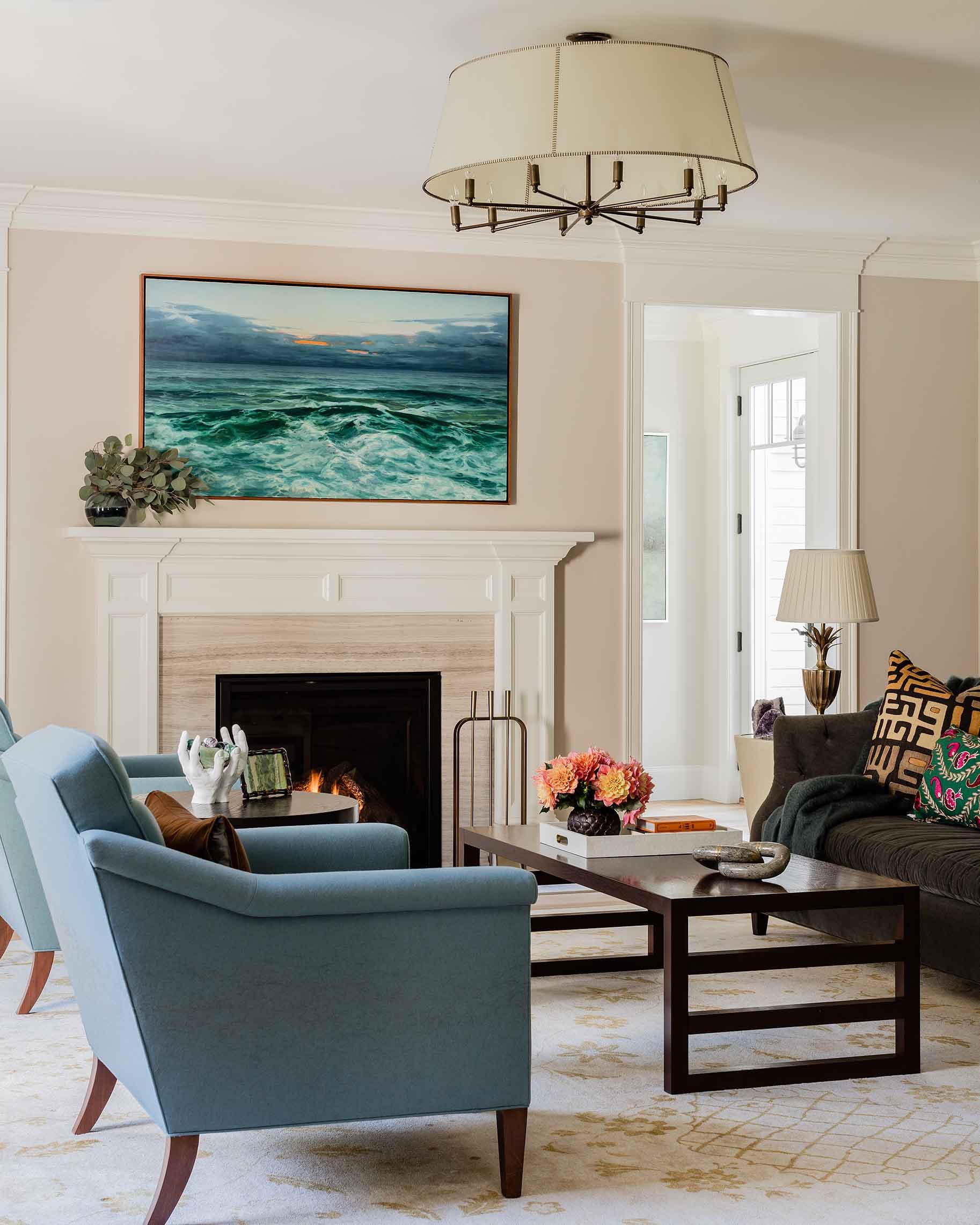 Formal living room with blue chairs and fireplace-Kate Maloney Interior Design