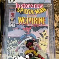 Cover of a comic book featuring Spider-Man and Wolverine with a 'In store now' sign at the top.