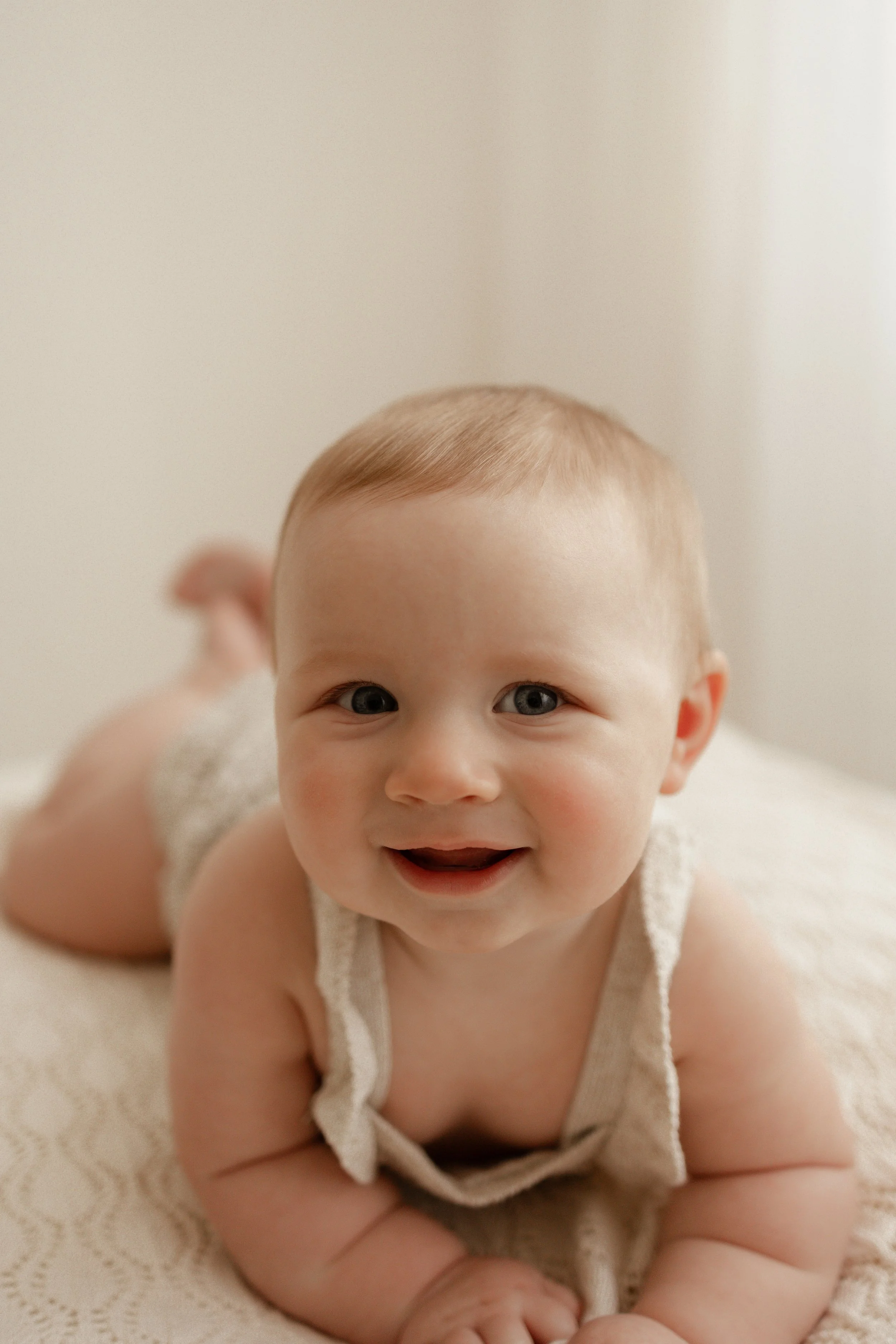smiley baby with gorgeous chubby rolls