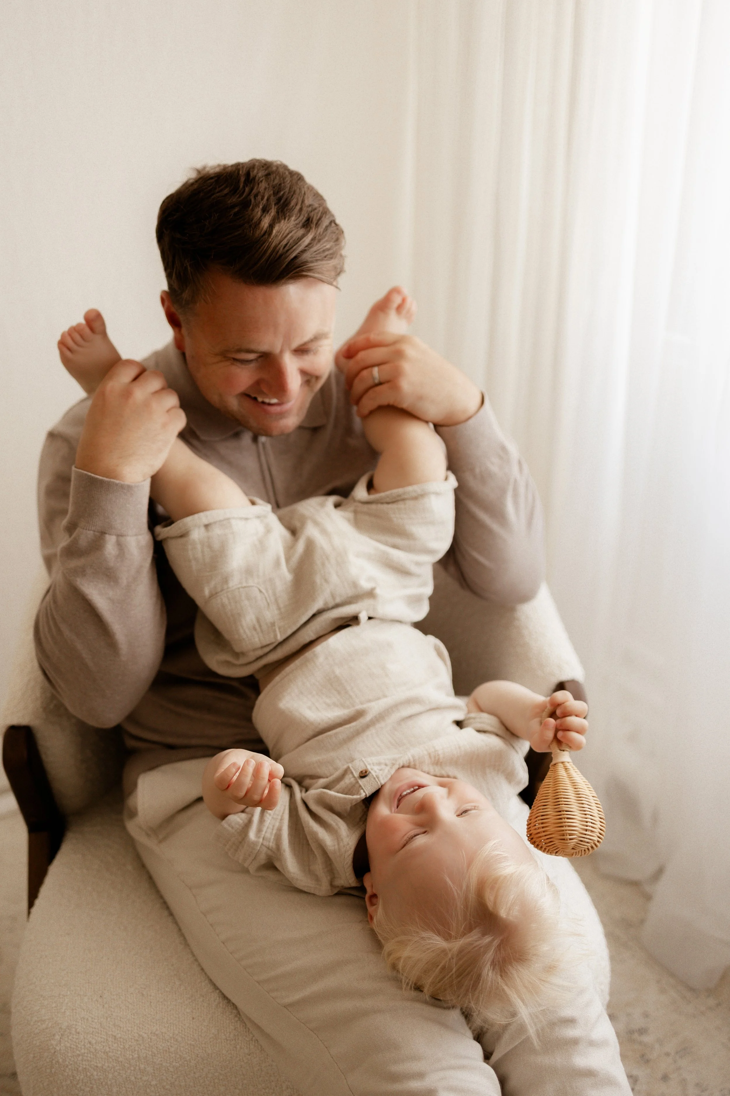 dad and son playing - joyful 