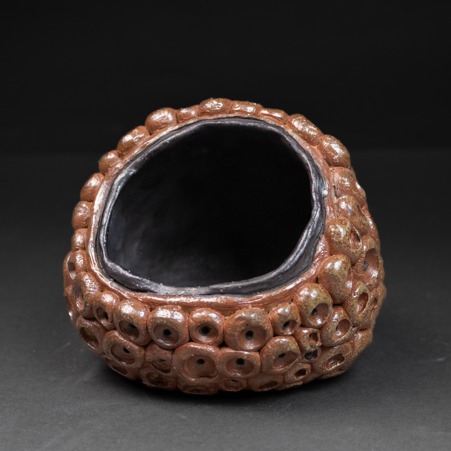 Salt Pig, black slip, soda, cone 10, 4'' x 5'' x 3.5'', 2024