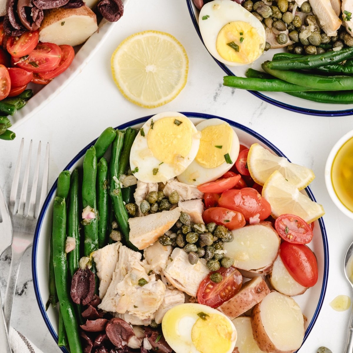 Looking to try something new?  Let us introduce you to our Chicken Ni&ccedil;oise Salad!  Naturally healthy and quintessentially Mediterranean, this dish hits so many flavors, is dairy free, and satisfies that lunch time craving.  And the best part? 