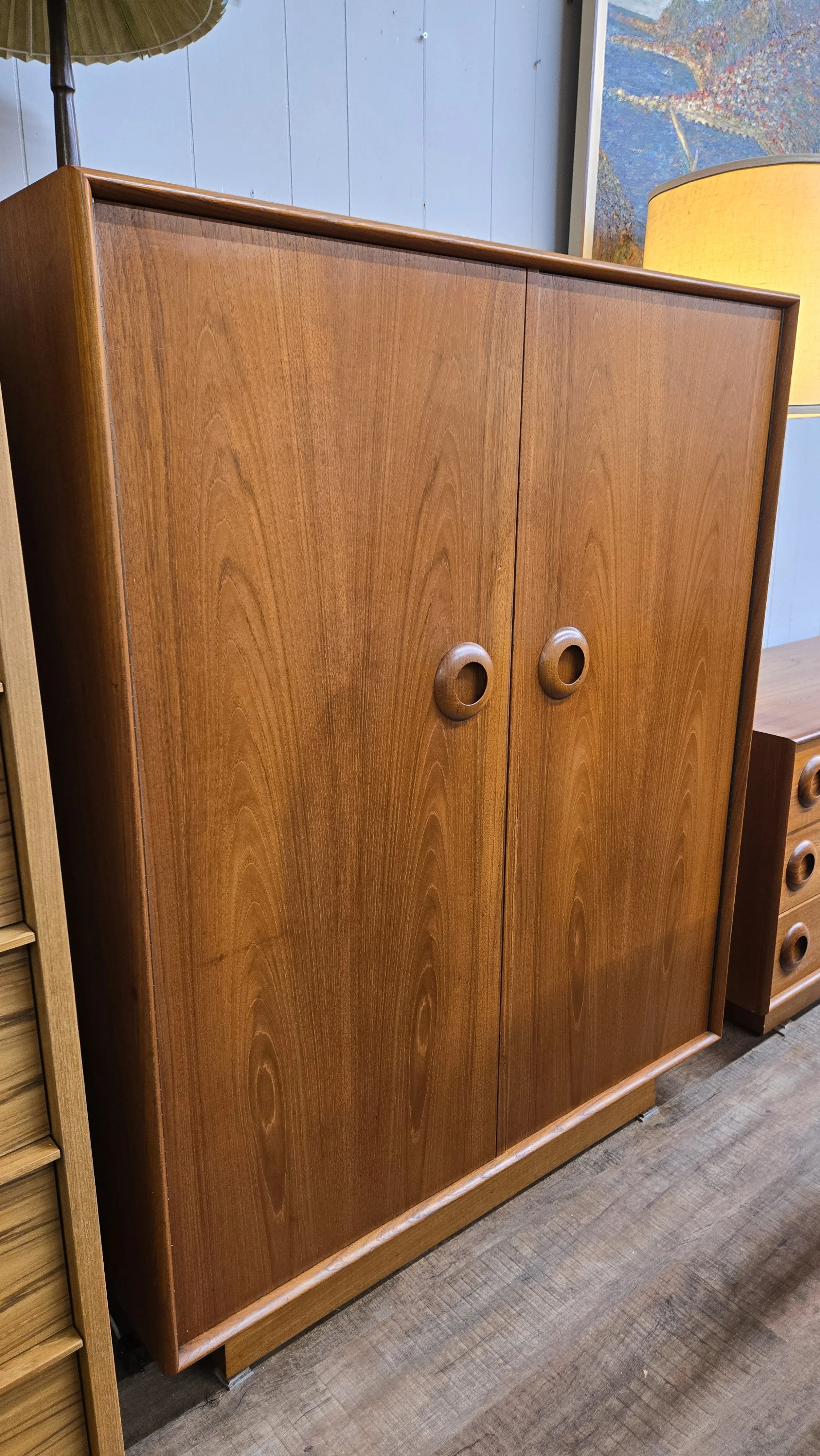 Vintage teak tall dresser with round handles