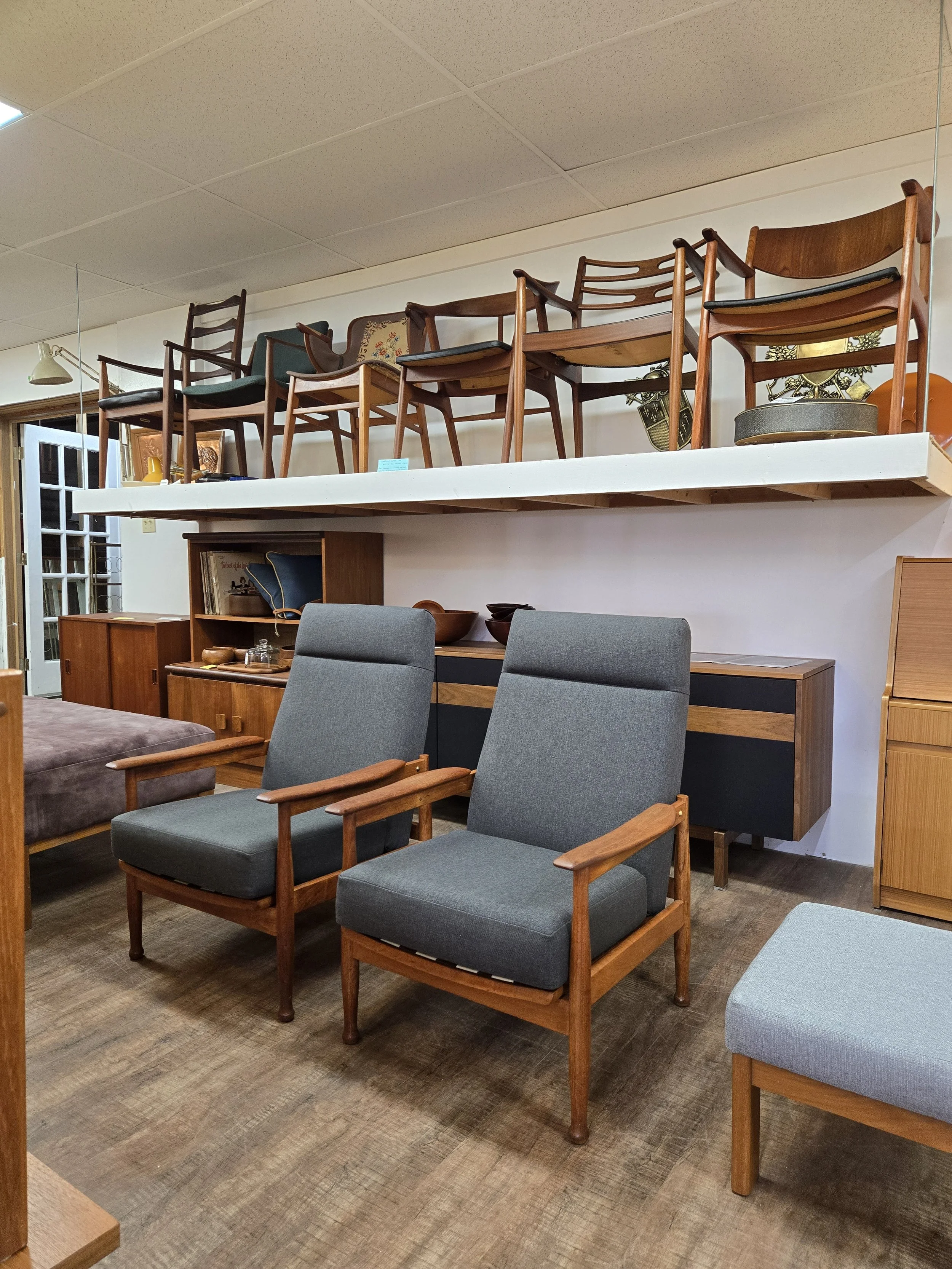 Pair of High back mid century recliners by Guy Rogers