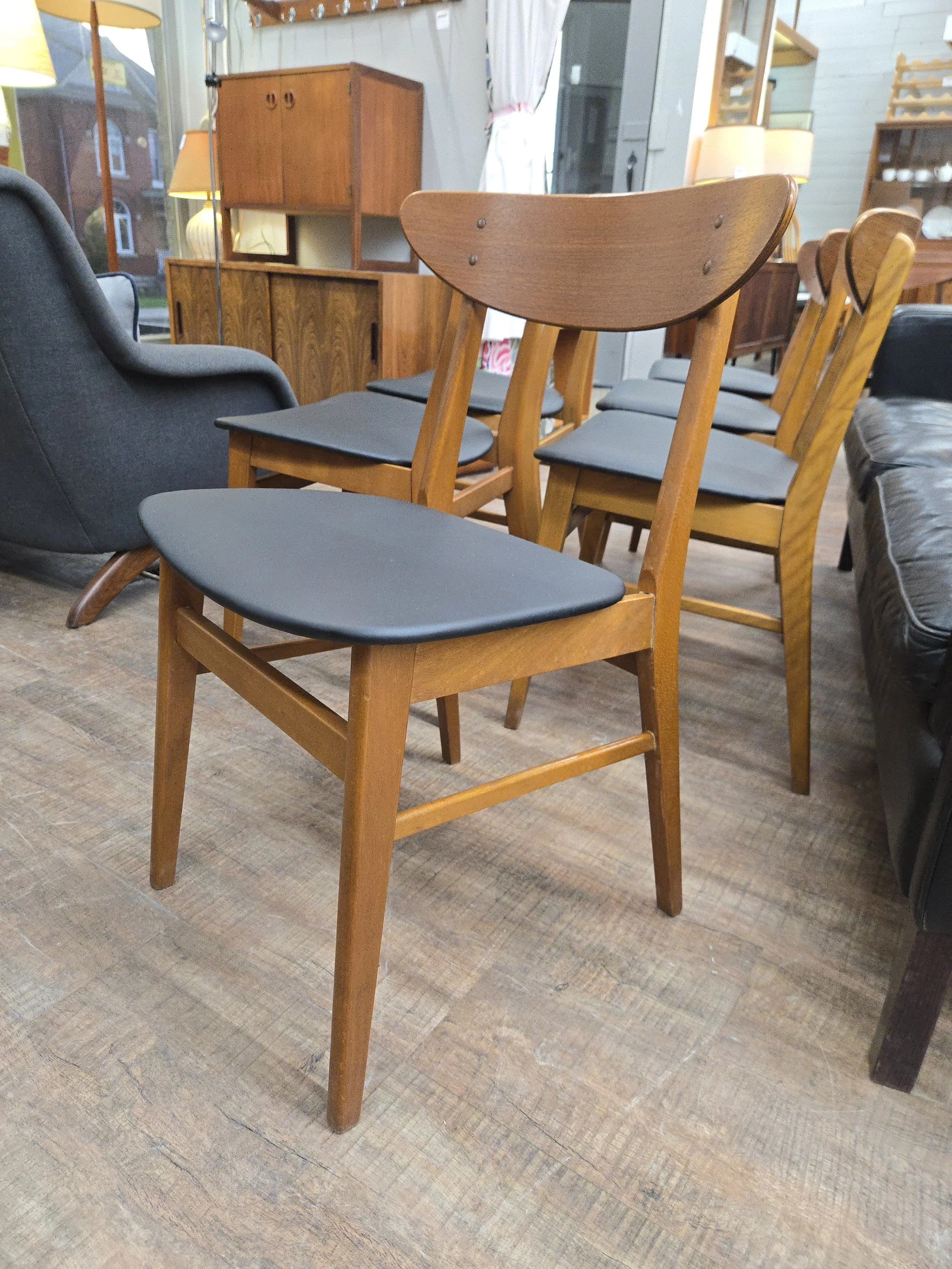 Vintage teak dining chairs by Farstrup