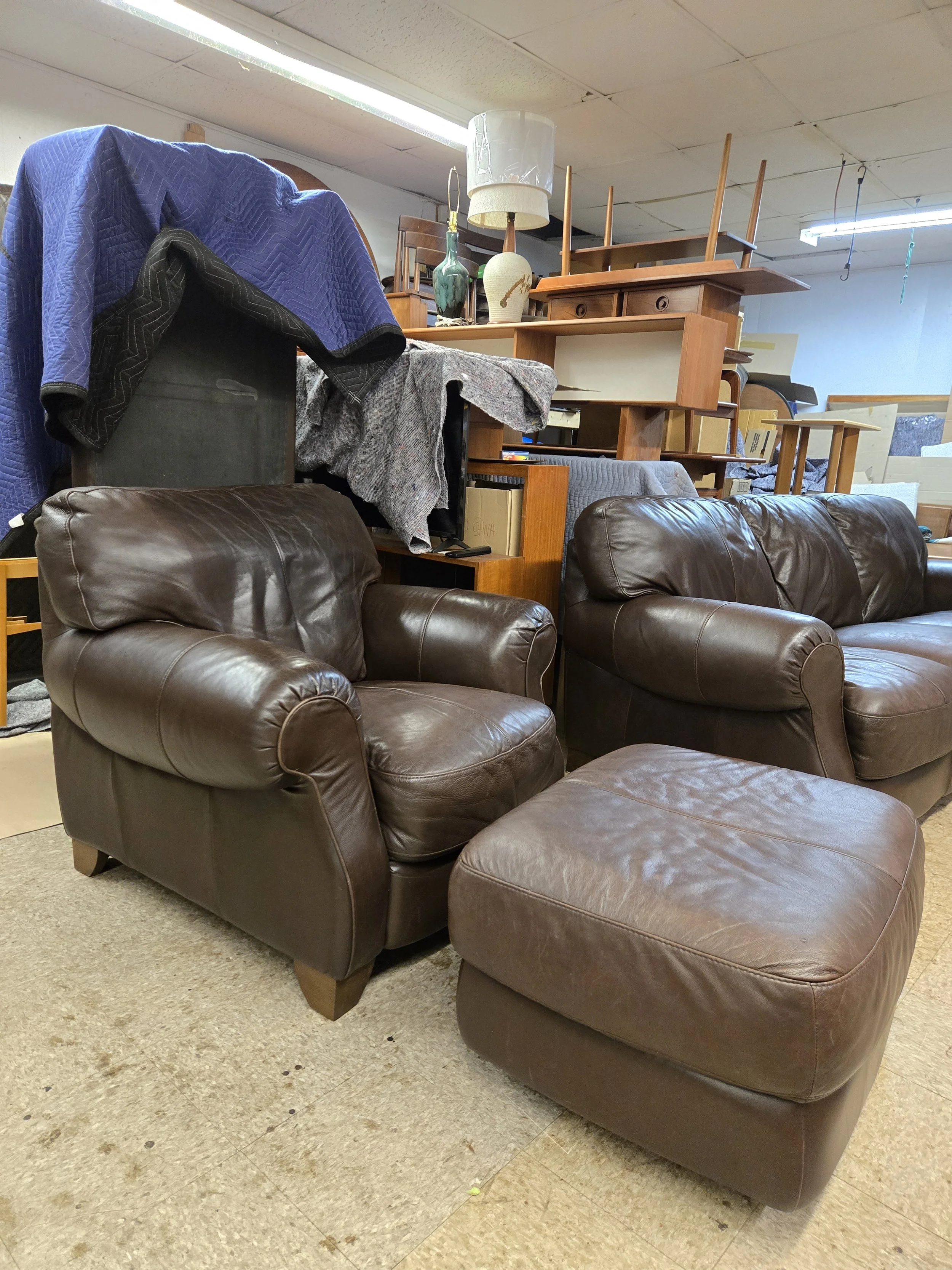 Sculptural Vintage leather chair and ottoman