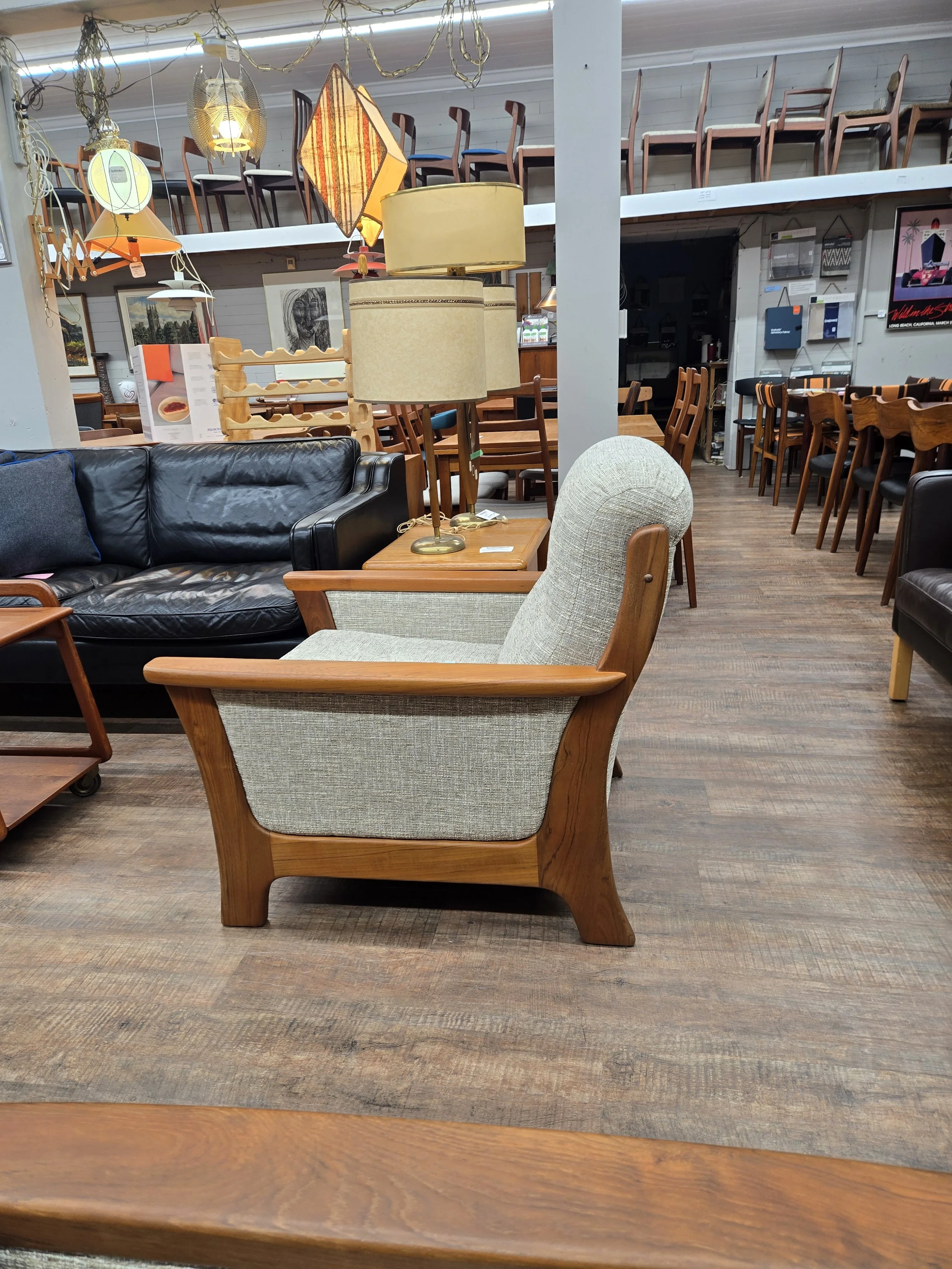 Fully restored vintage teak framed lounge chair