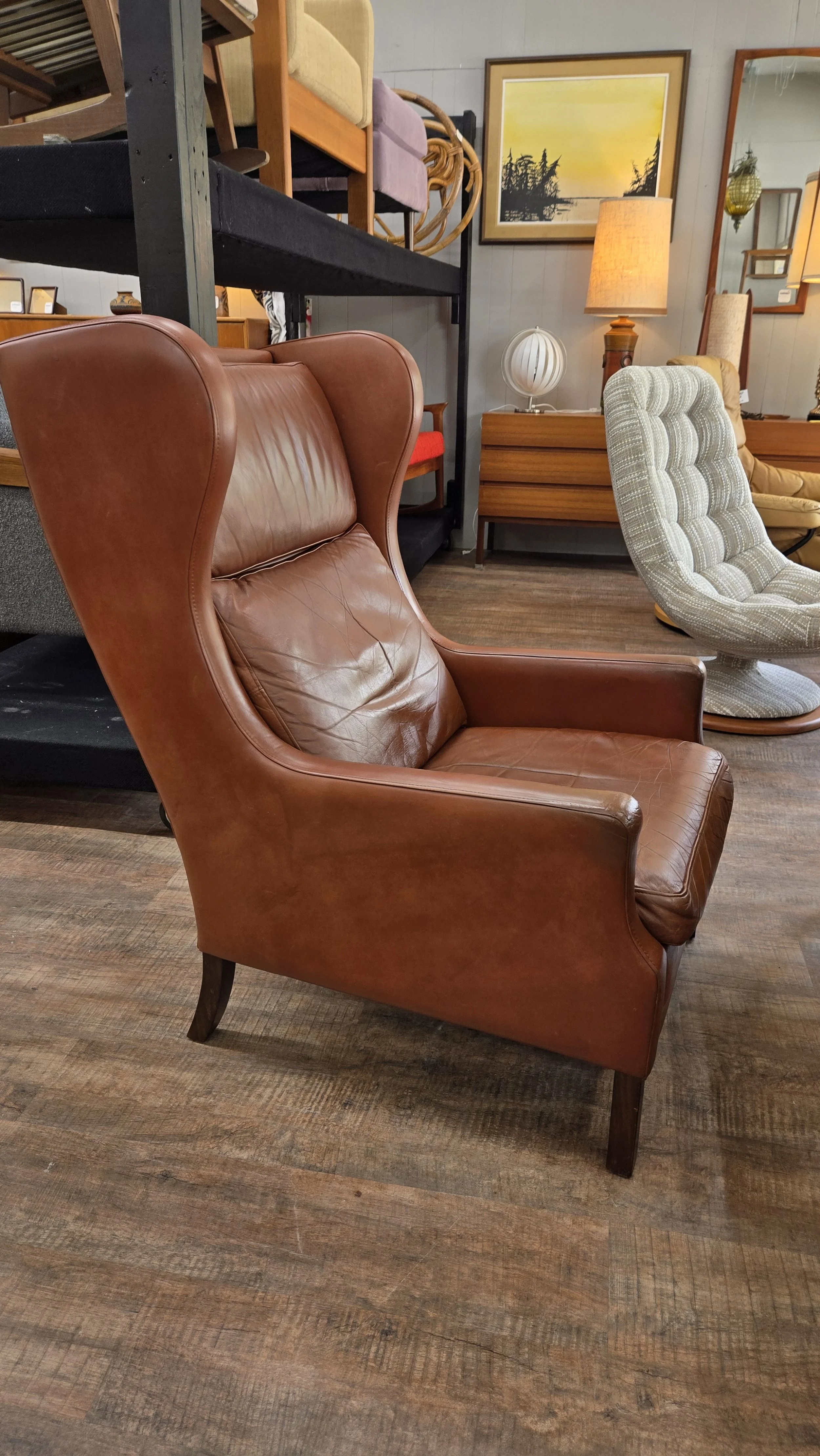 high back wing chair by Stouby