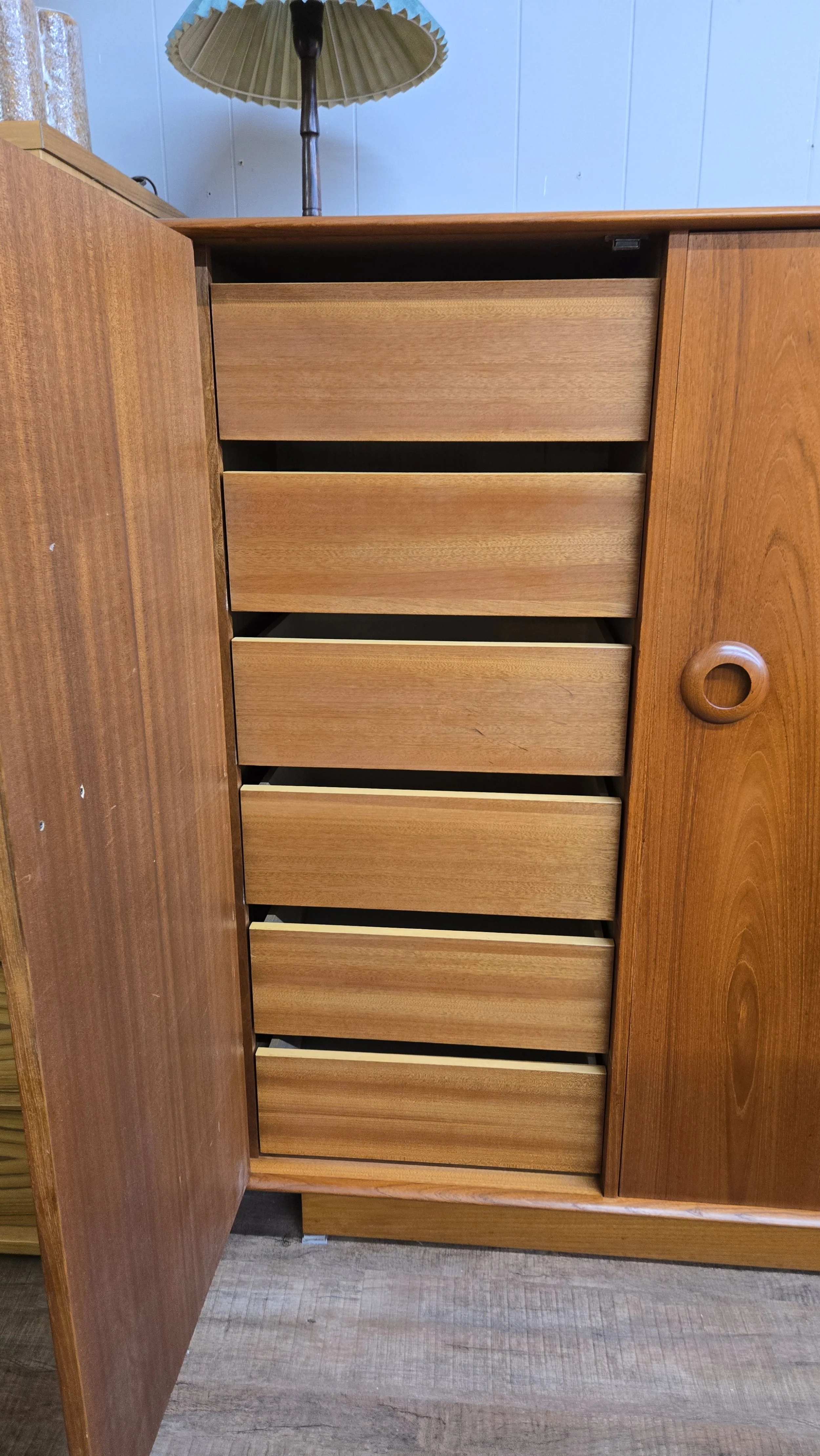 Vintage teak tall dresser with round handles