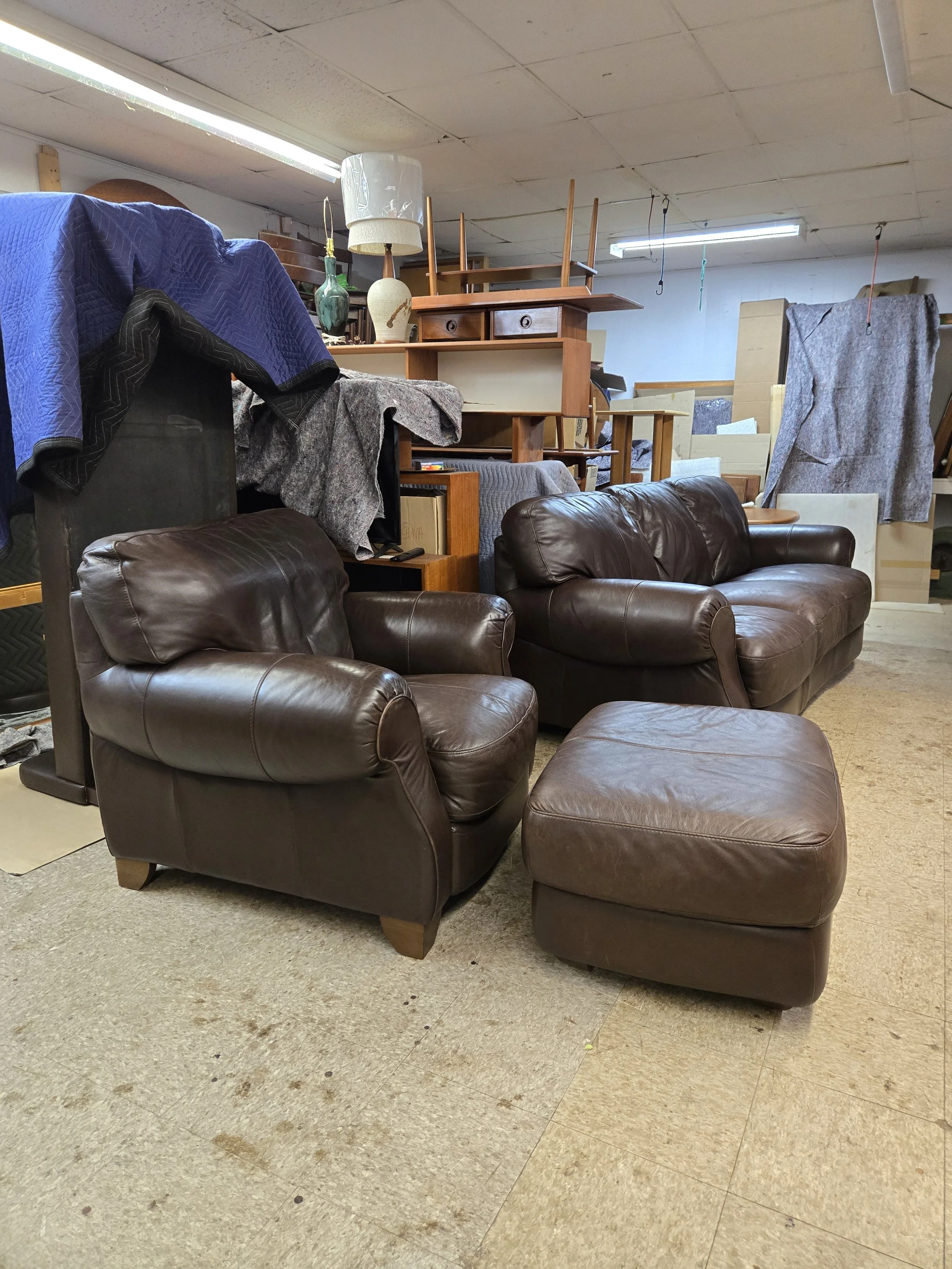 Sculptural Vintage leather chair and ottoman