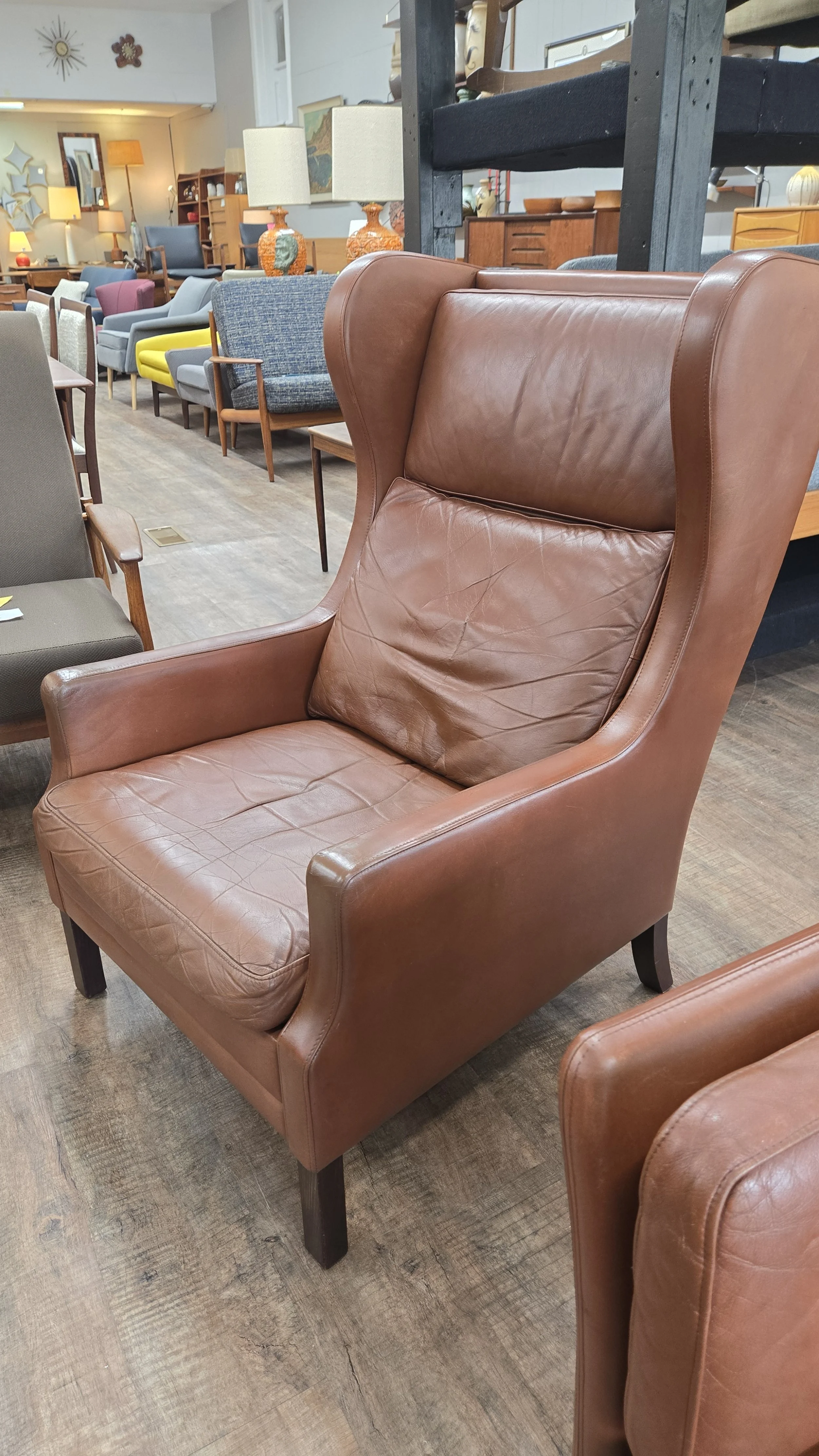 high back wing chair by Stouby