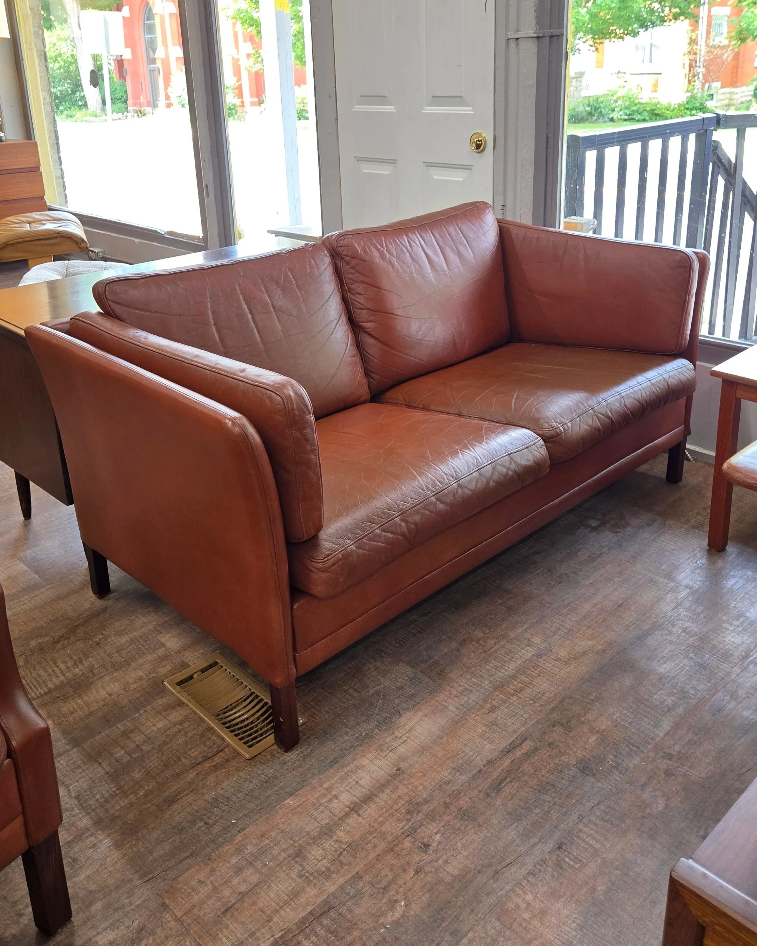Leather and rosewood loveseat by Stouby