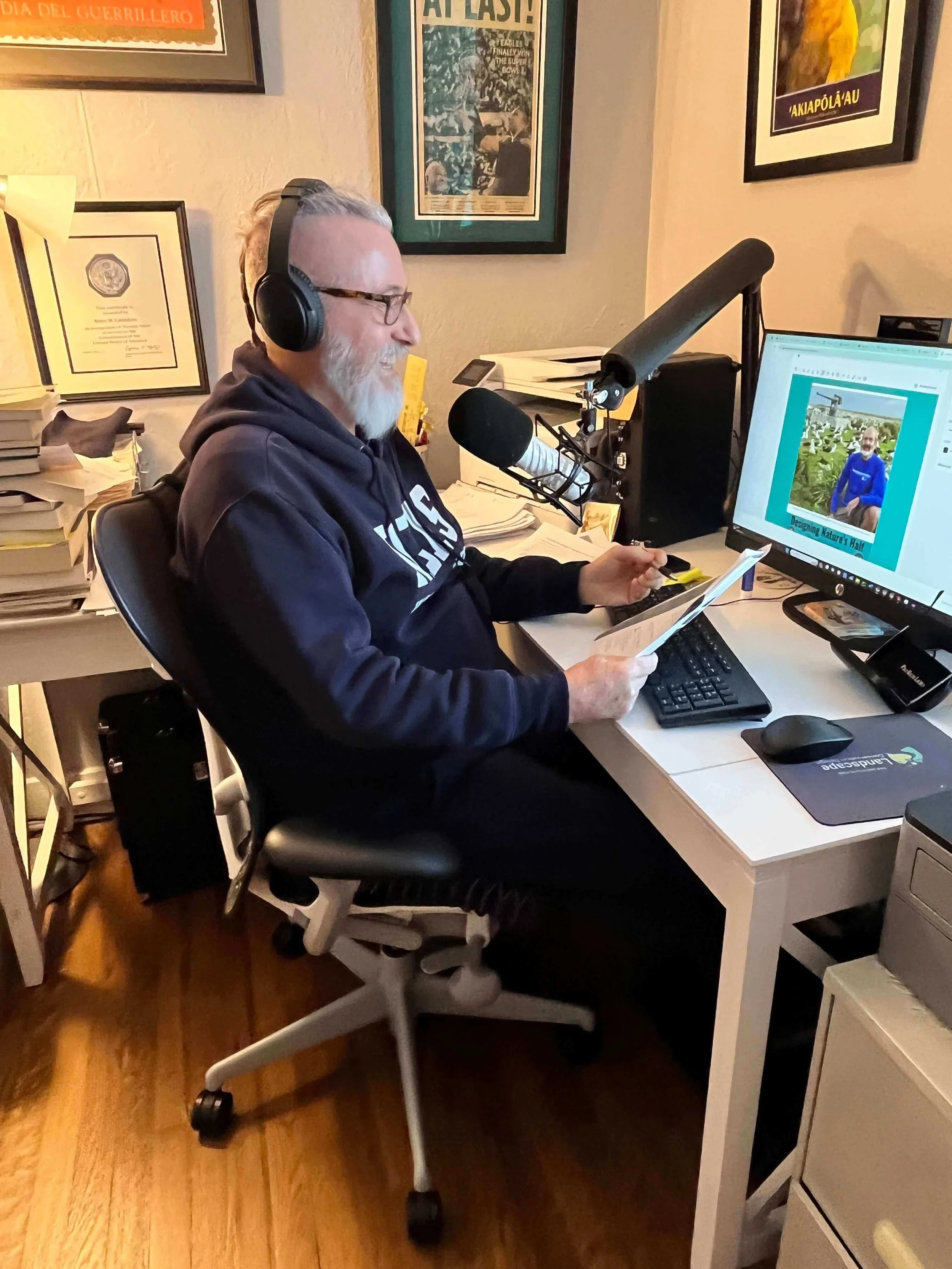 Robert Campellone in his home office creating a strategy to save the planet re's Half