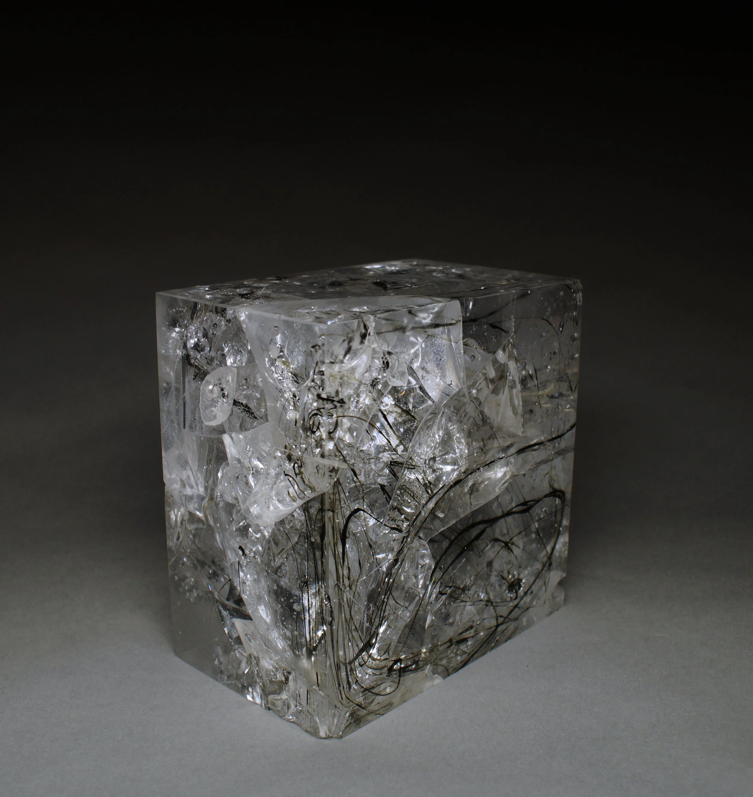 Olivia Leigh Curtis (📍United States), "E.SA05af (Slag Casting 5)," hot-cast and cold worked glass, iron slag, 2021. Photo credit: Abigail Ogilvy Gallery. 8 x 8 x 5".