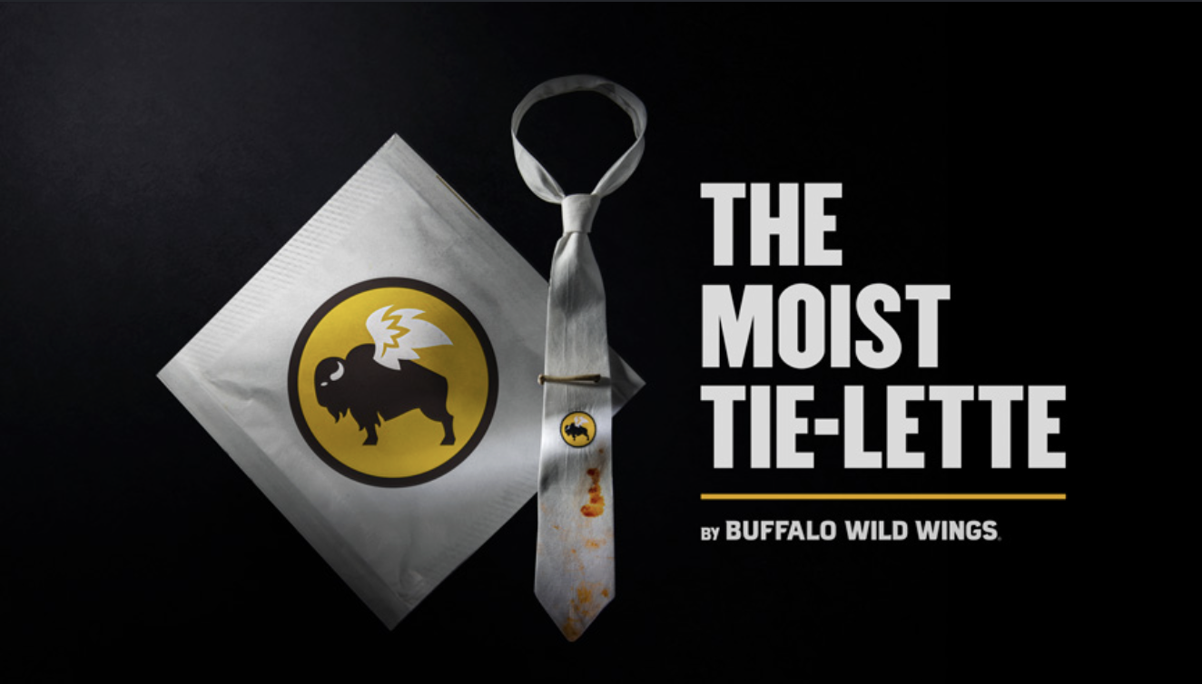 A packet of buffalo wing sauce and a tied white tie with a buffalo wing logo, alongside text saying 'The Moist Tie-Lette by Buffalo Wild Wings'.