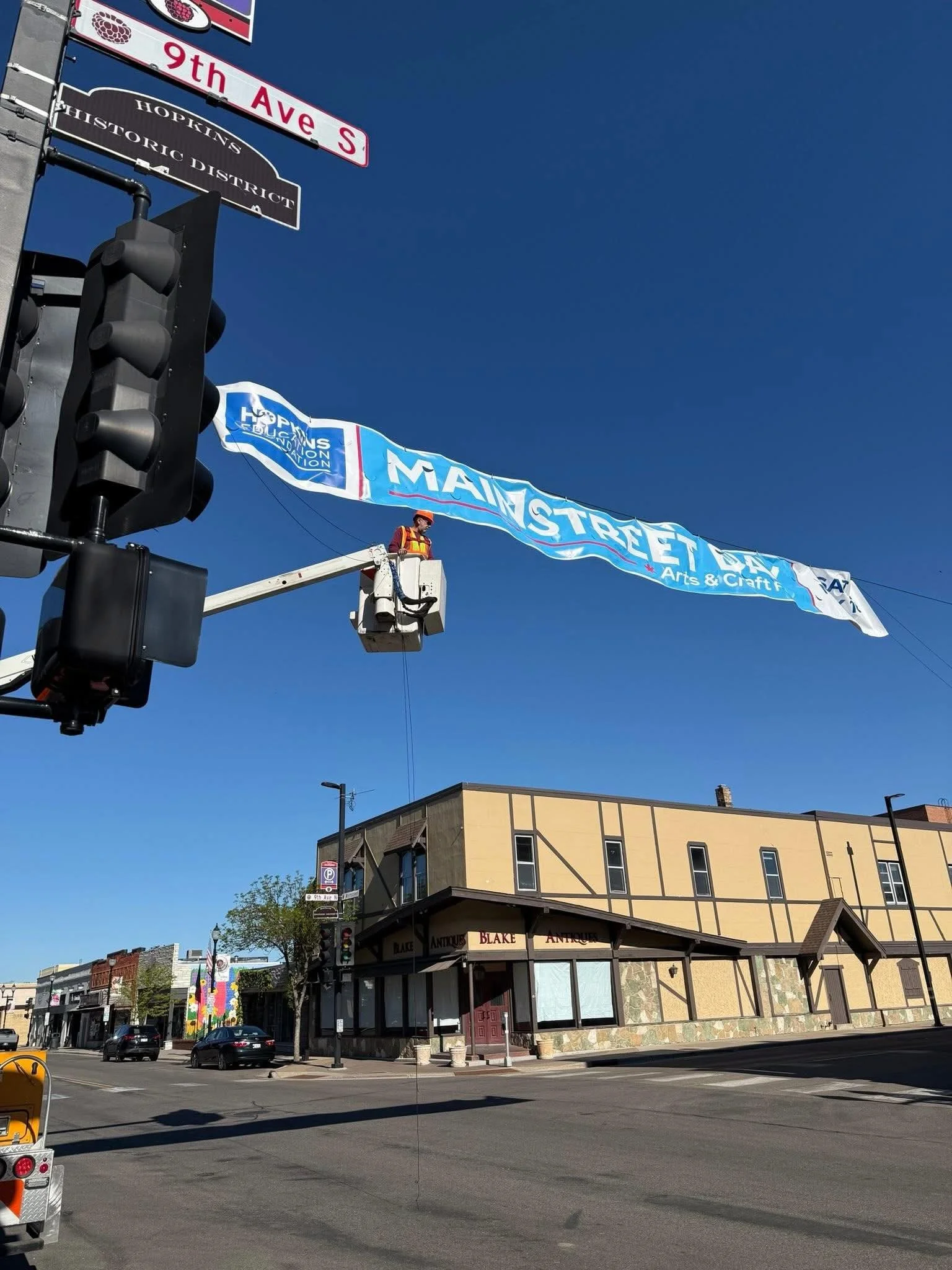 Spotted: Public Works putting up the @mainstreetdayhopkins banner. See you Saturday!