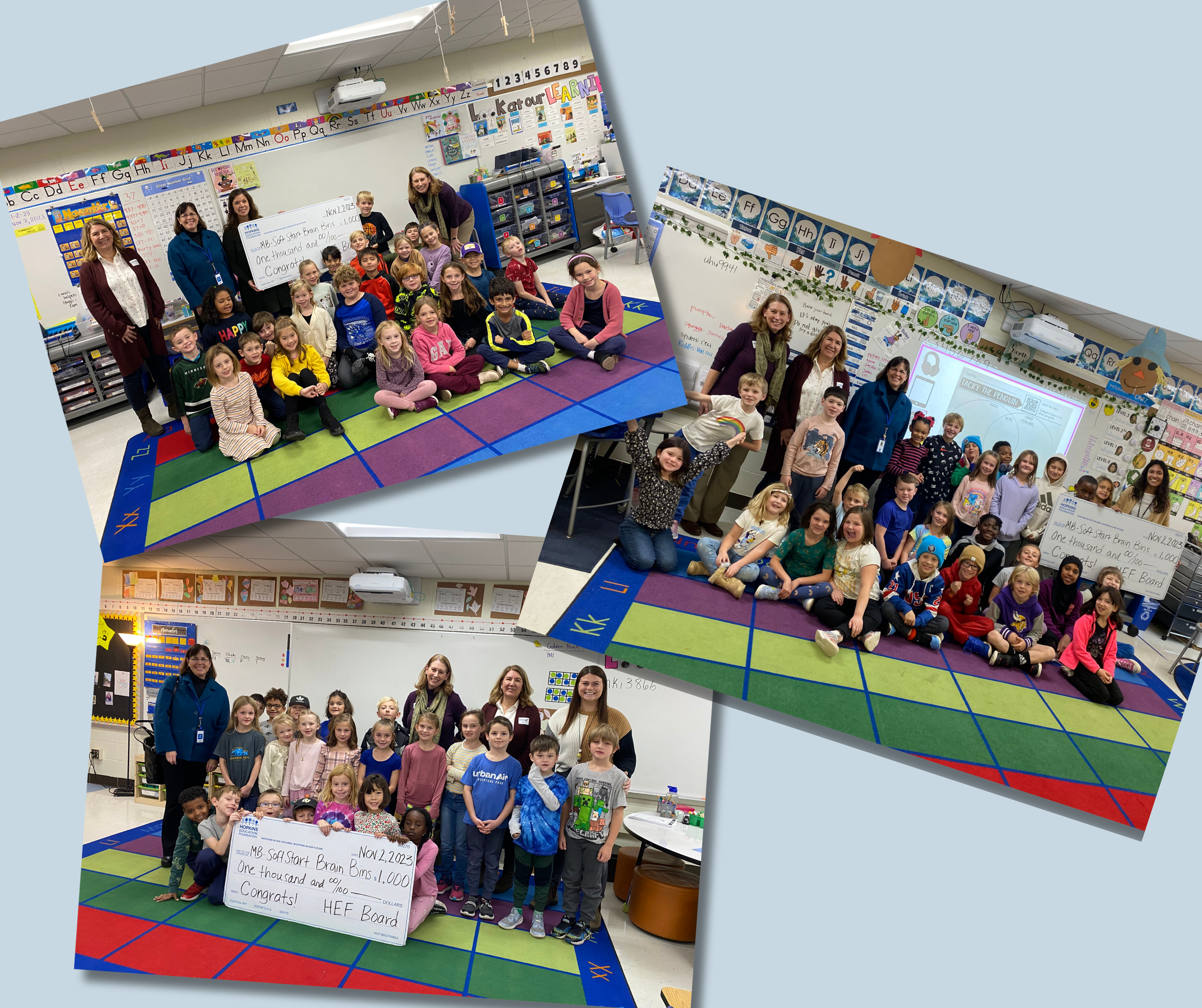 Group of students and adults with large grant check