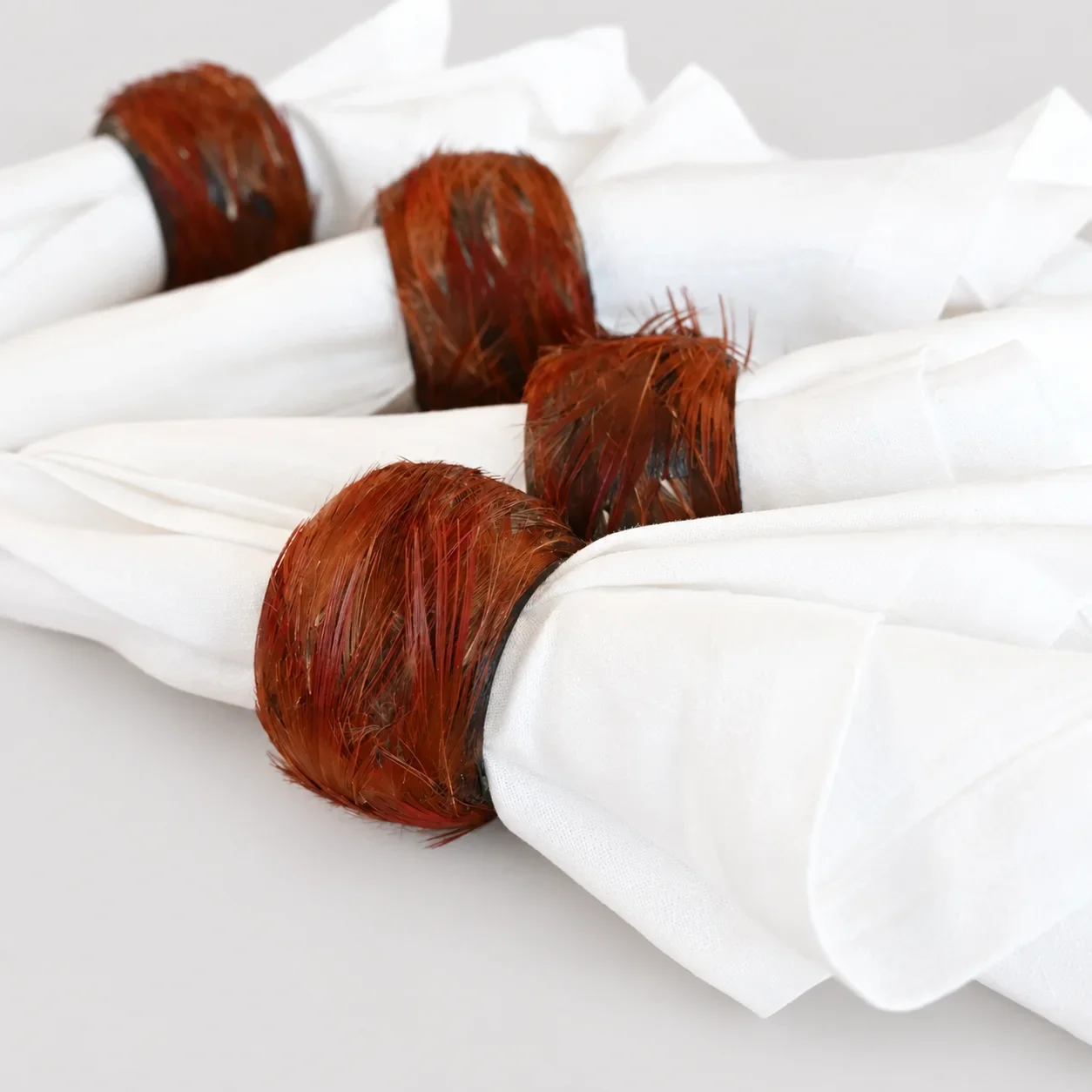 golden-pheasant-feathered-napkin-rings-product-shot (1).webp
