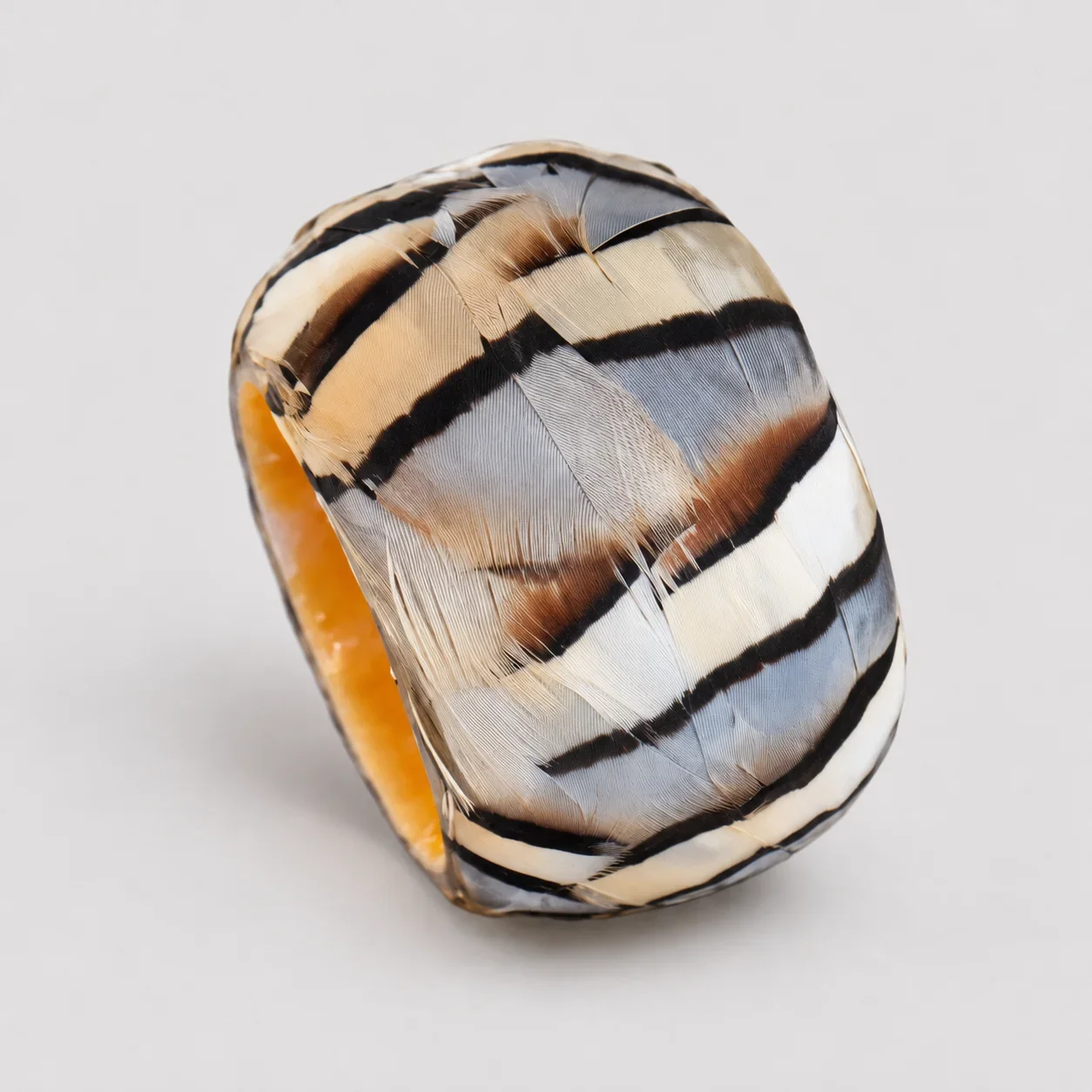 striped-golden-pheasant-feathered-napkin-rings-product-shot (1).webp
