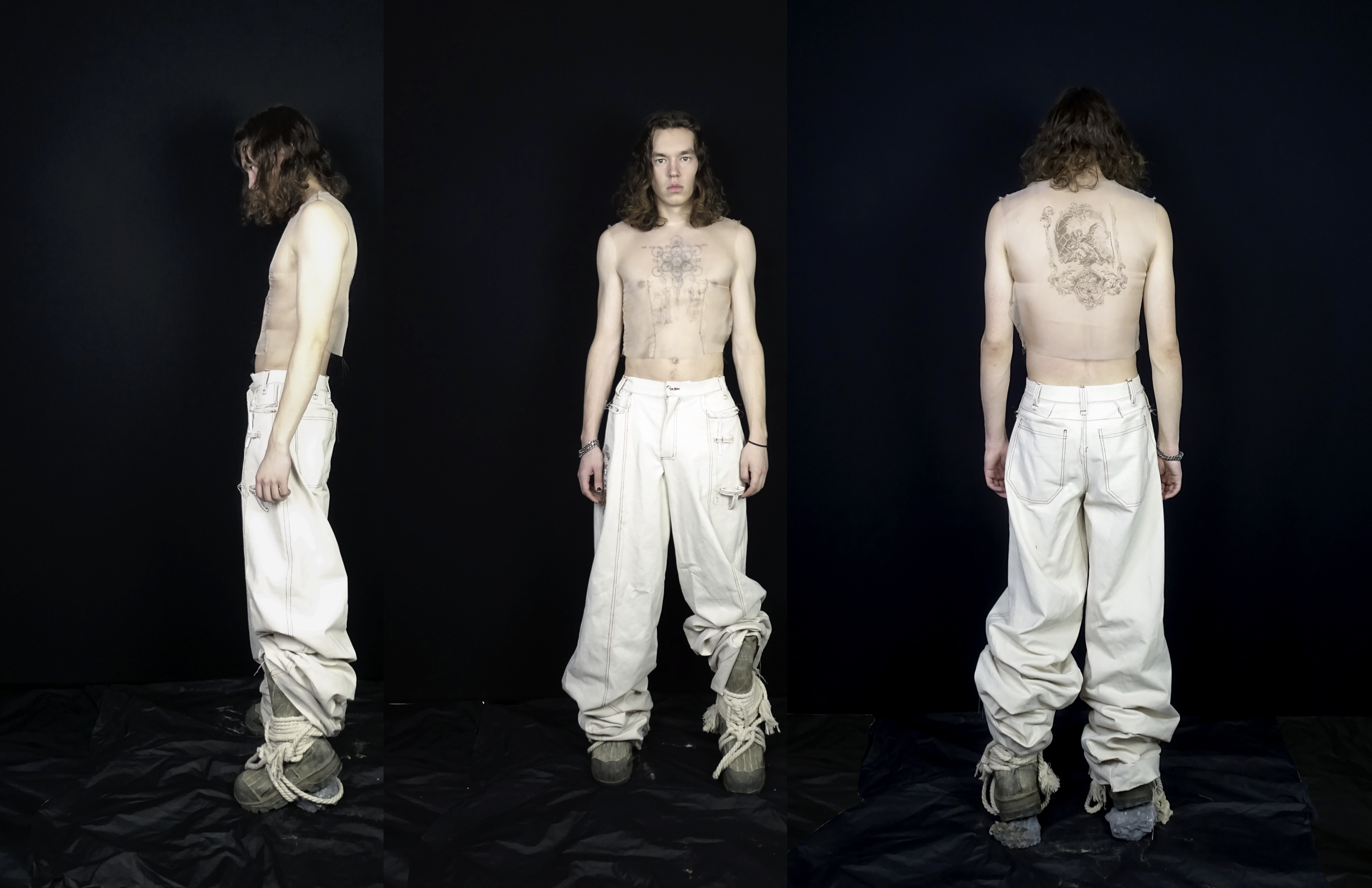 elliott zylstra in tattoo print organza top, oversized street pants, and street boots by conor o'driscoll.