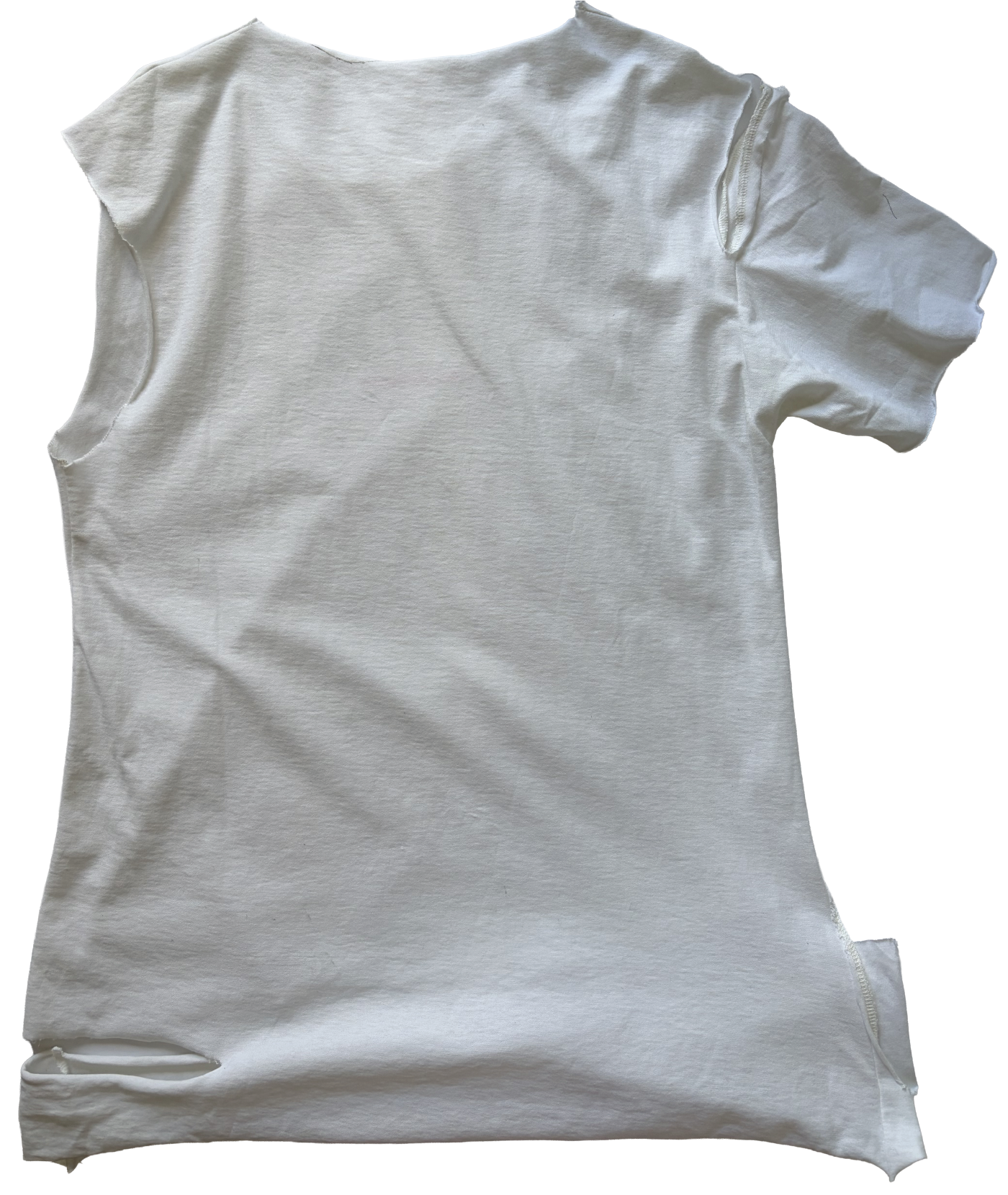 A white T-shirt with a frayed neckline, damaged left sleeve, and ripped lower edge by conor o'driscoll.