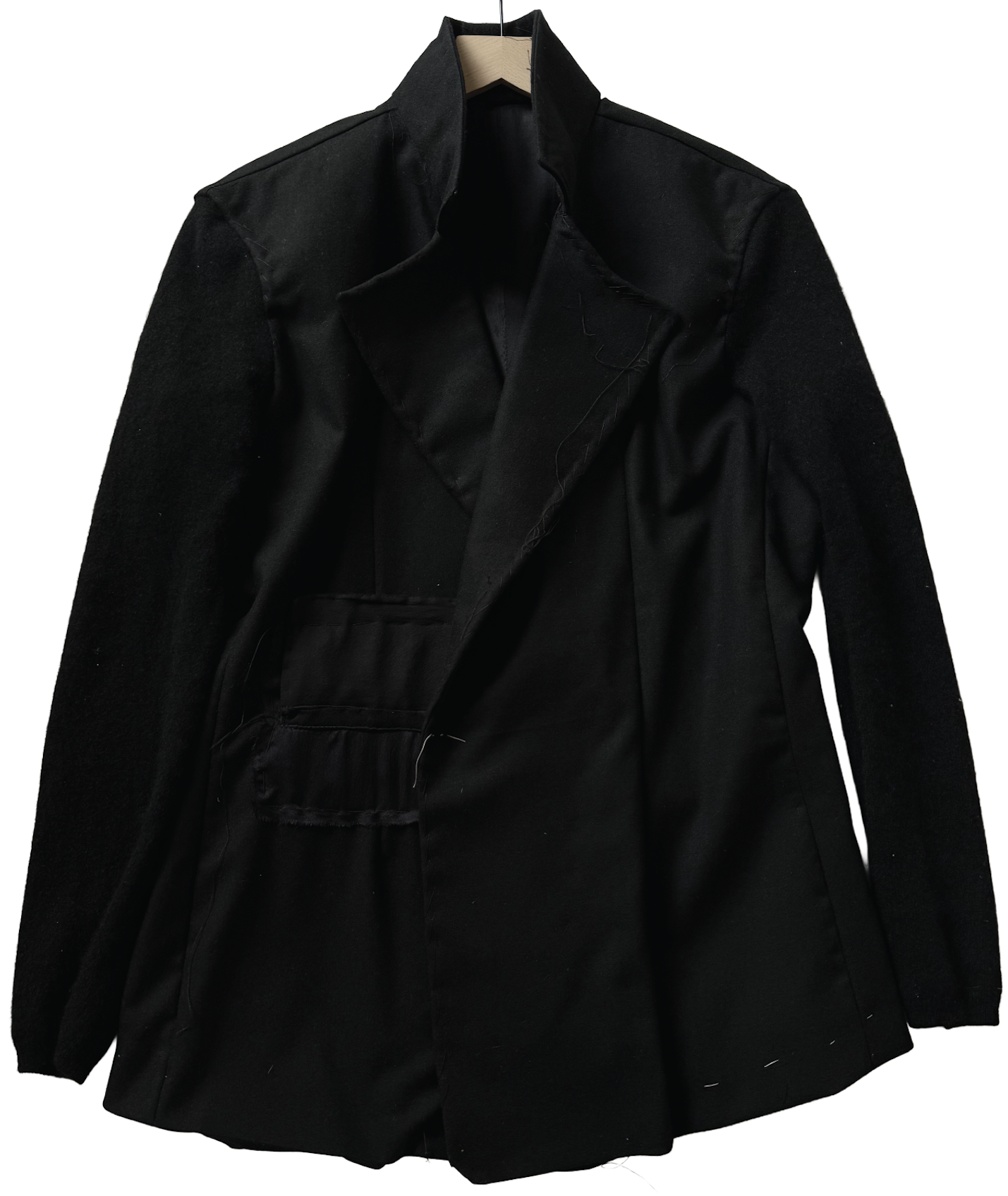undone wool & cashmere blazer featuring reversed welt pockets left basted open, hand-stitching left exposed throughout, cashmere sweater sleeves, busted oversized lining with varied silks, busted center-back vent, and true unisex fit conor o'driscoll