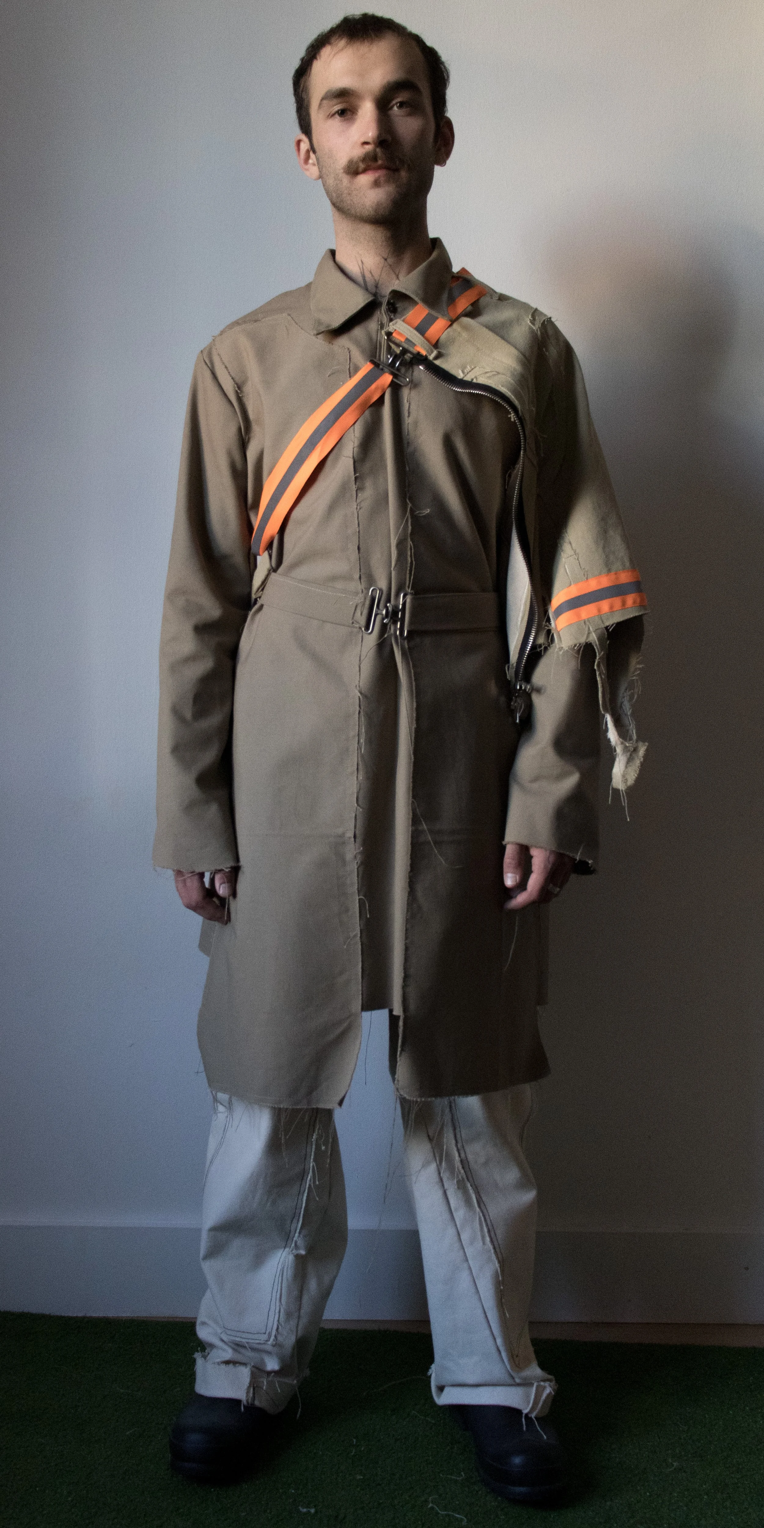 grant philips wearing work attire work shoulder sling attachment canvas pantsby conor odriscoll defective workwear collection 2022