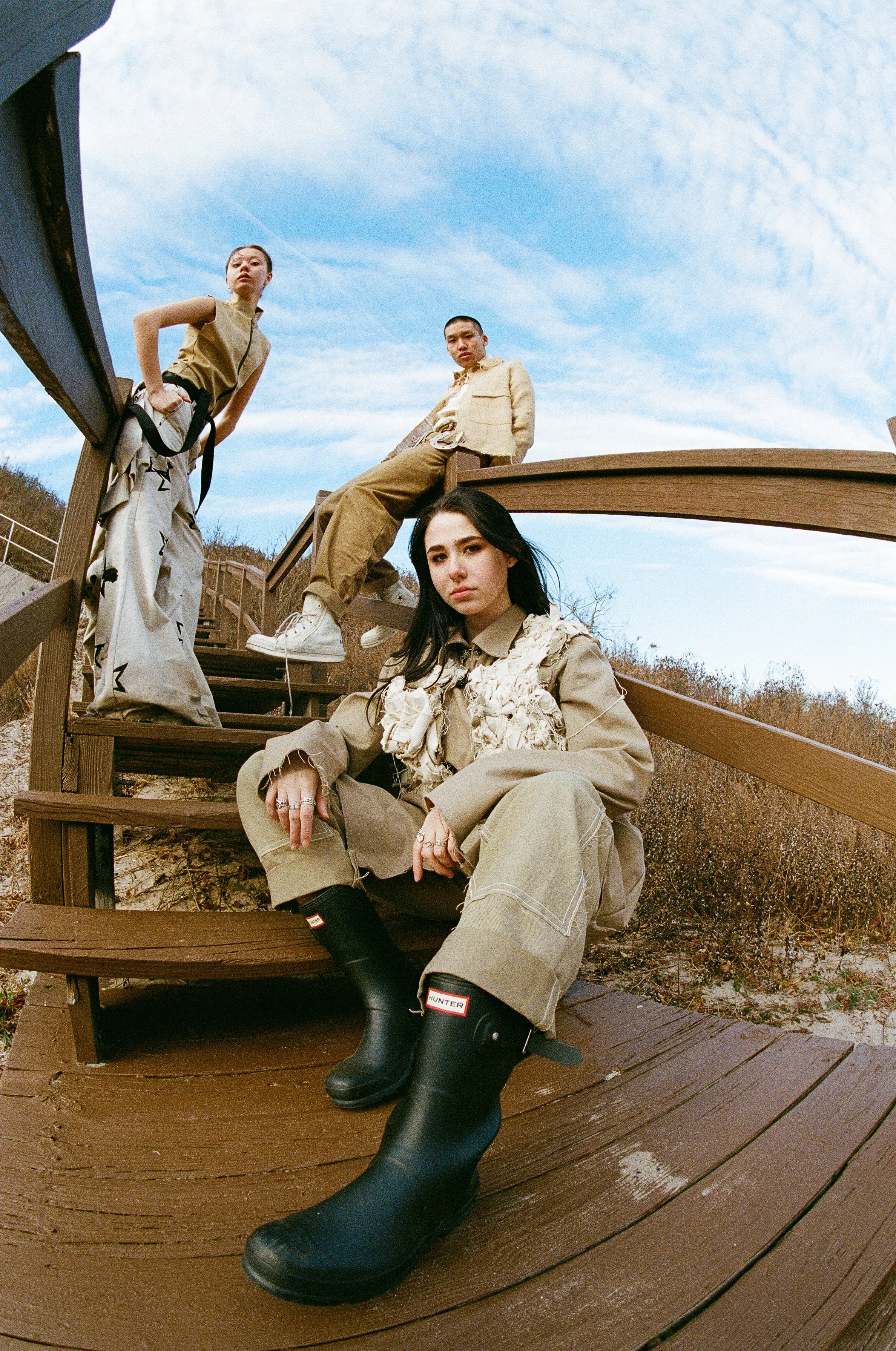 aisha zhanseit skye wilson and napan lee in conor odriscoll defective workwear 2022. shot by thomas paul walsh in new york city rockaway nyc