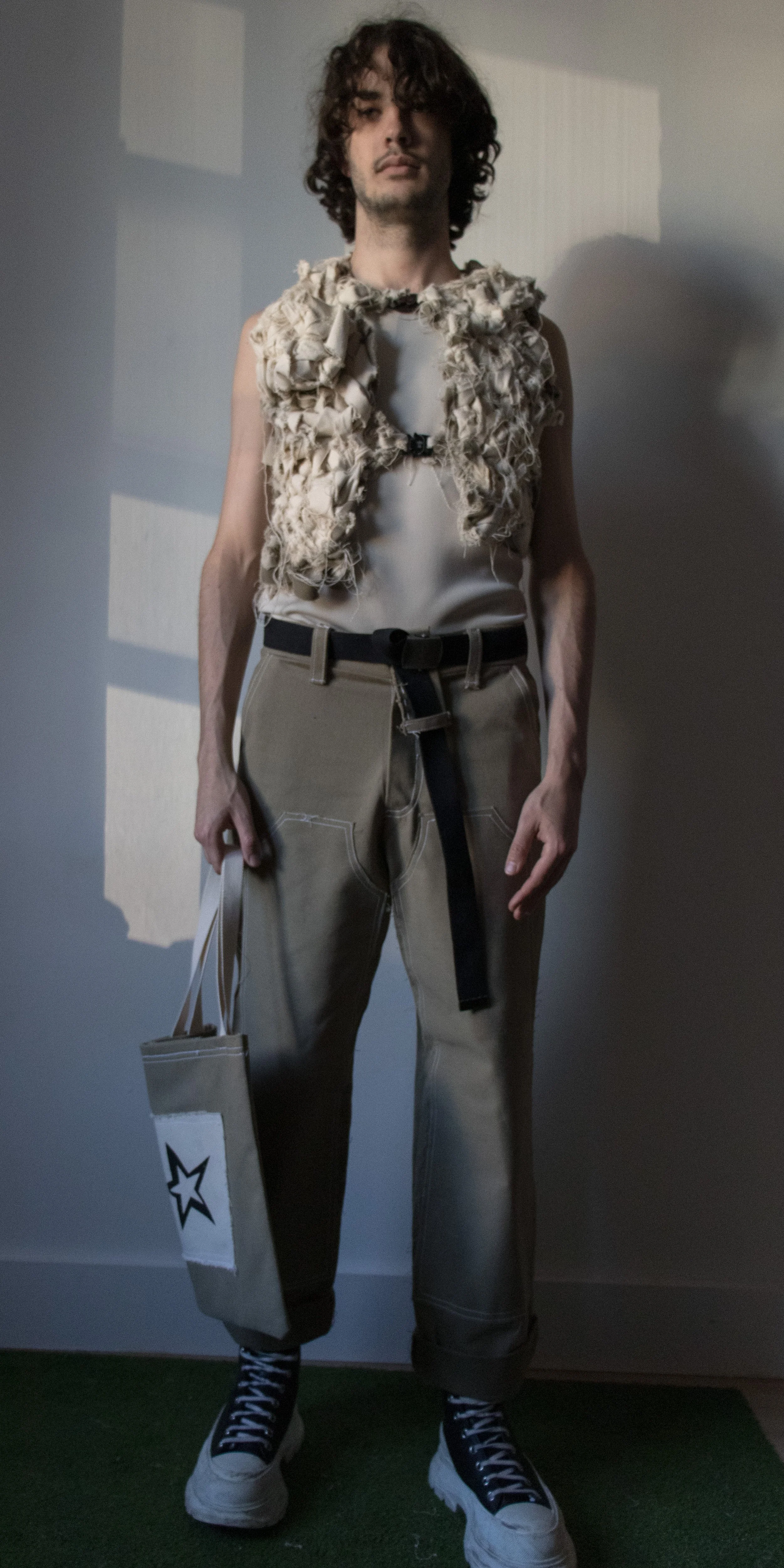 darcy wearing woven scrap canvas vest office tank top green belt work pants star tote bag by conor odriscoll for defective workwear collection conor o'driscoll new york city nyc
