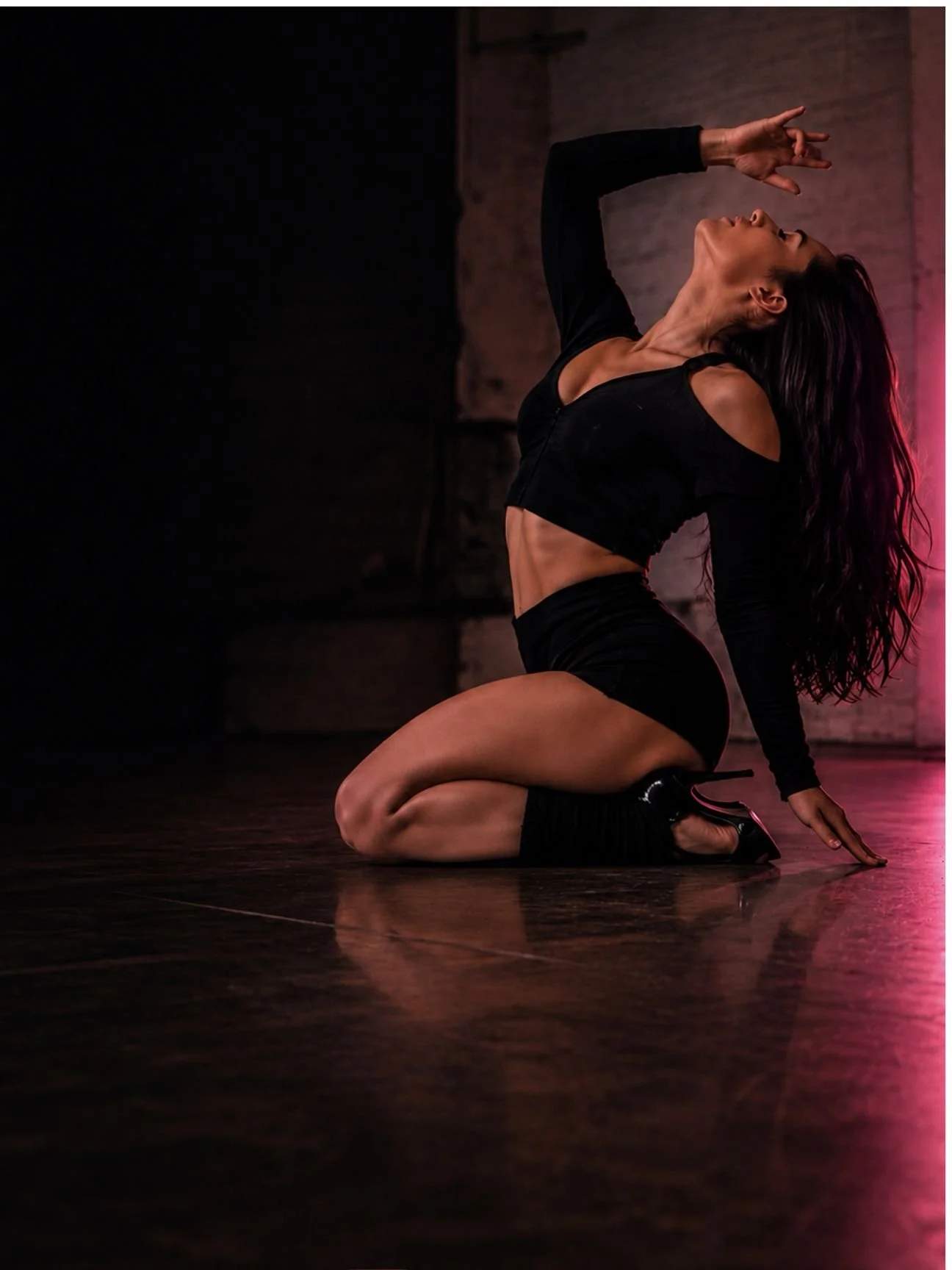 Dancer in heels performing sultry Femme Choreo choreography at Body Evolution Studios in Newmarket