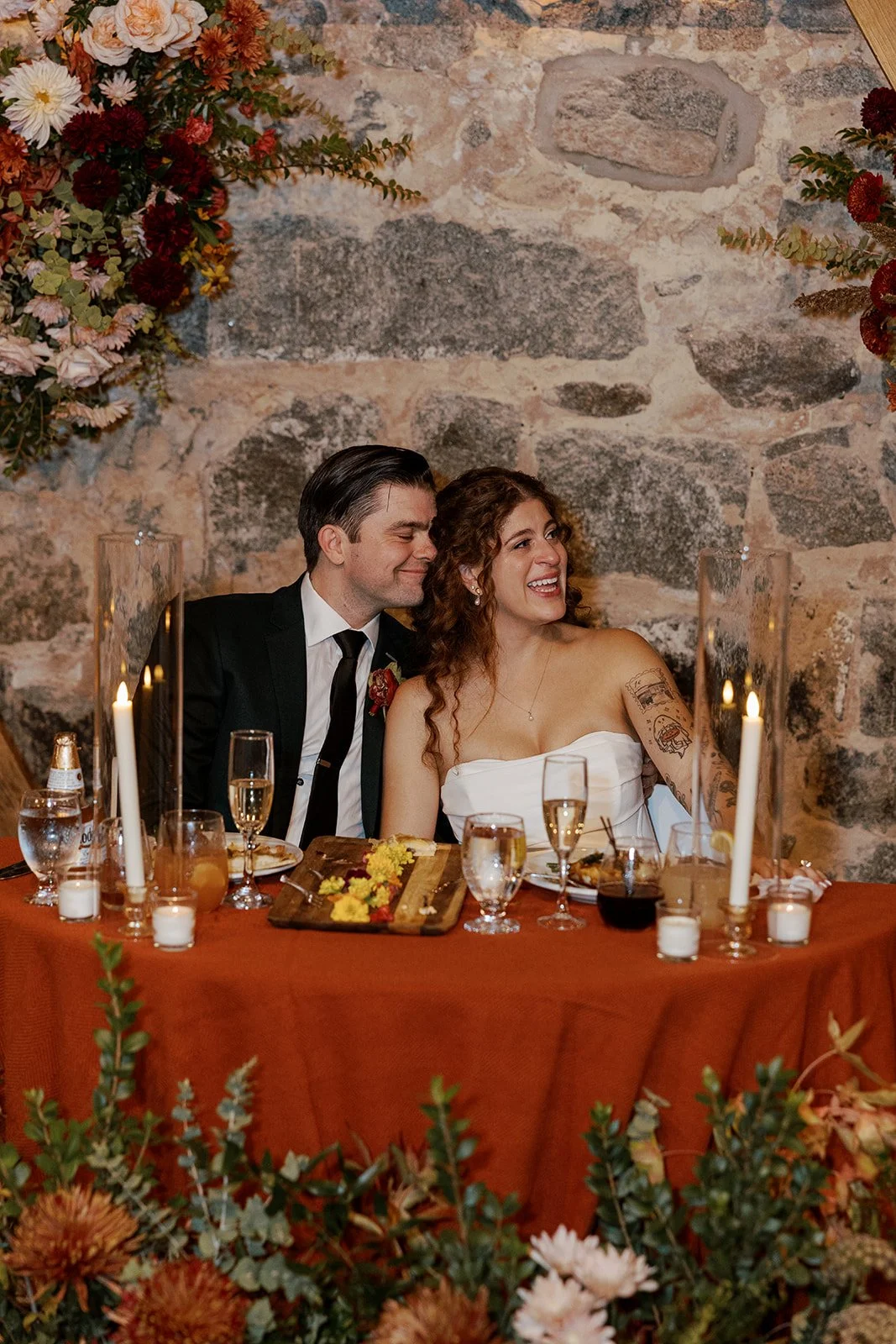 bride groom flower floral arrangement sweetheart table wedding arch reception table decor autumn main street ballroom ellicott city maryland