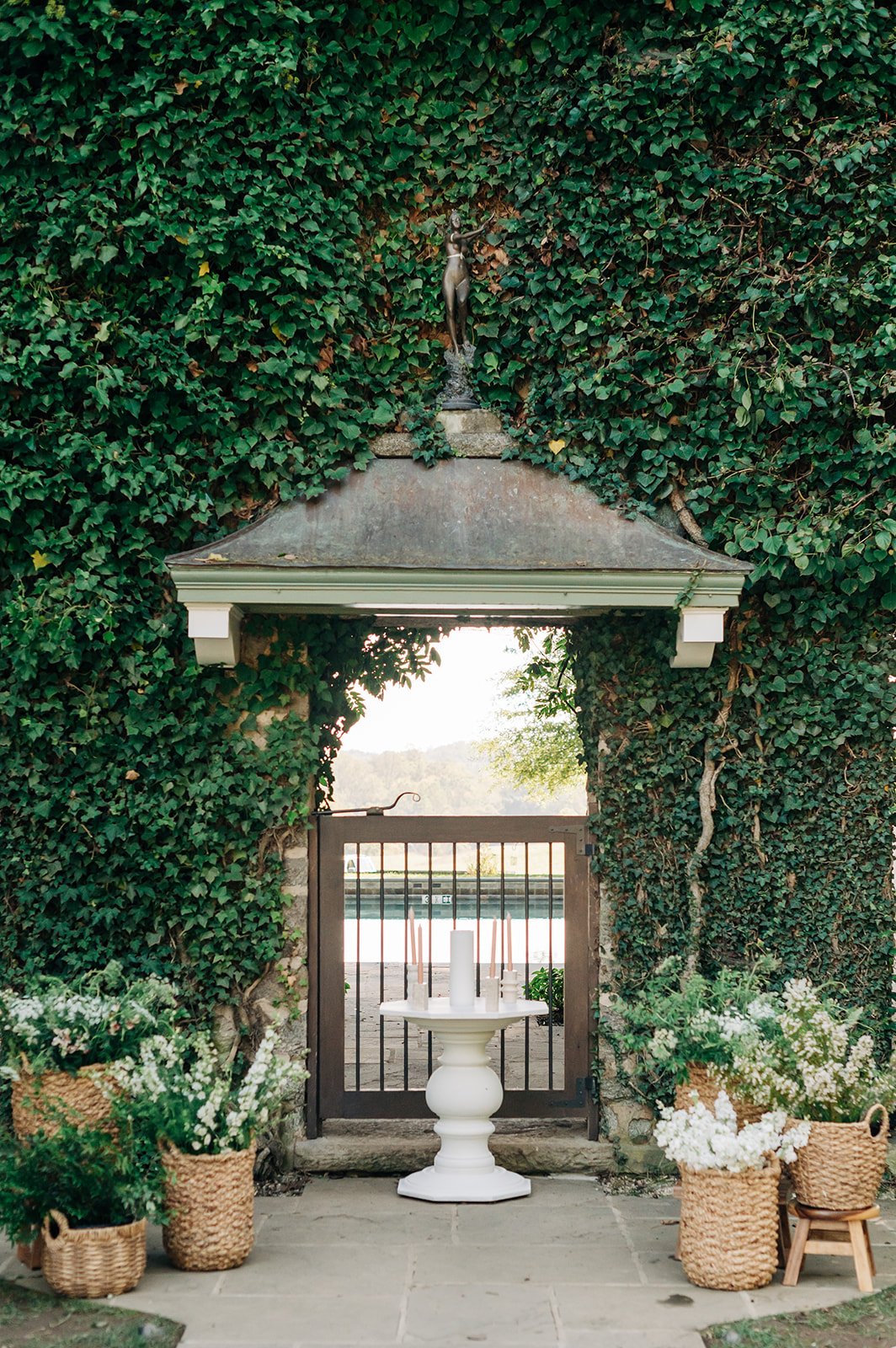 outdoor ceremony flowers floral basket arrangements goodstone inn restaurant pool