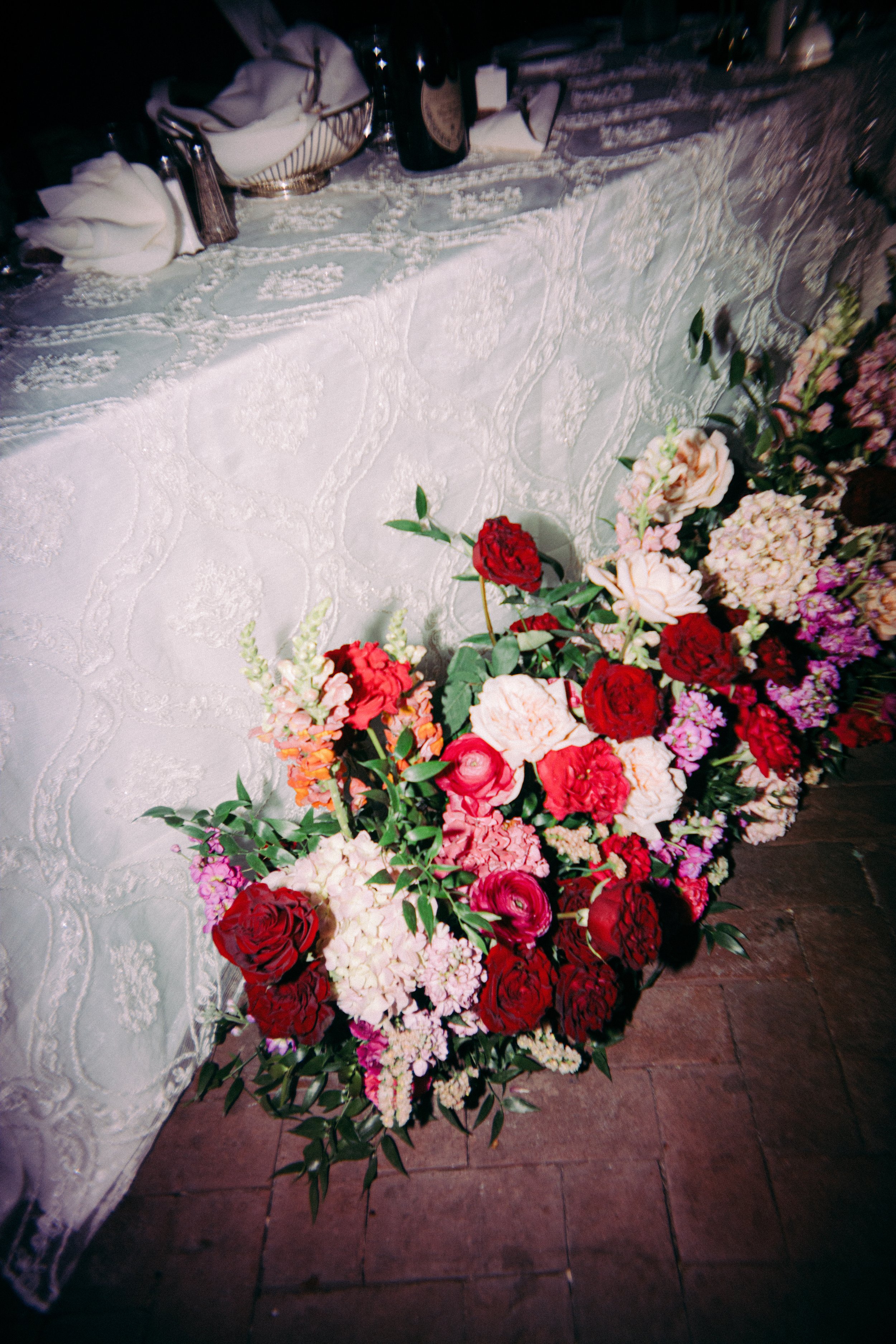WEDDING RECEPTION GROUND FLORALS RED PINK