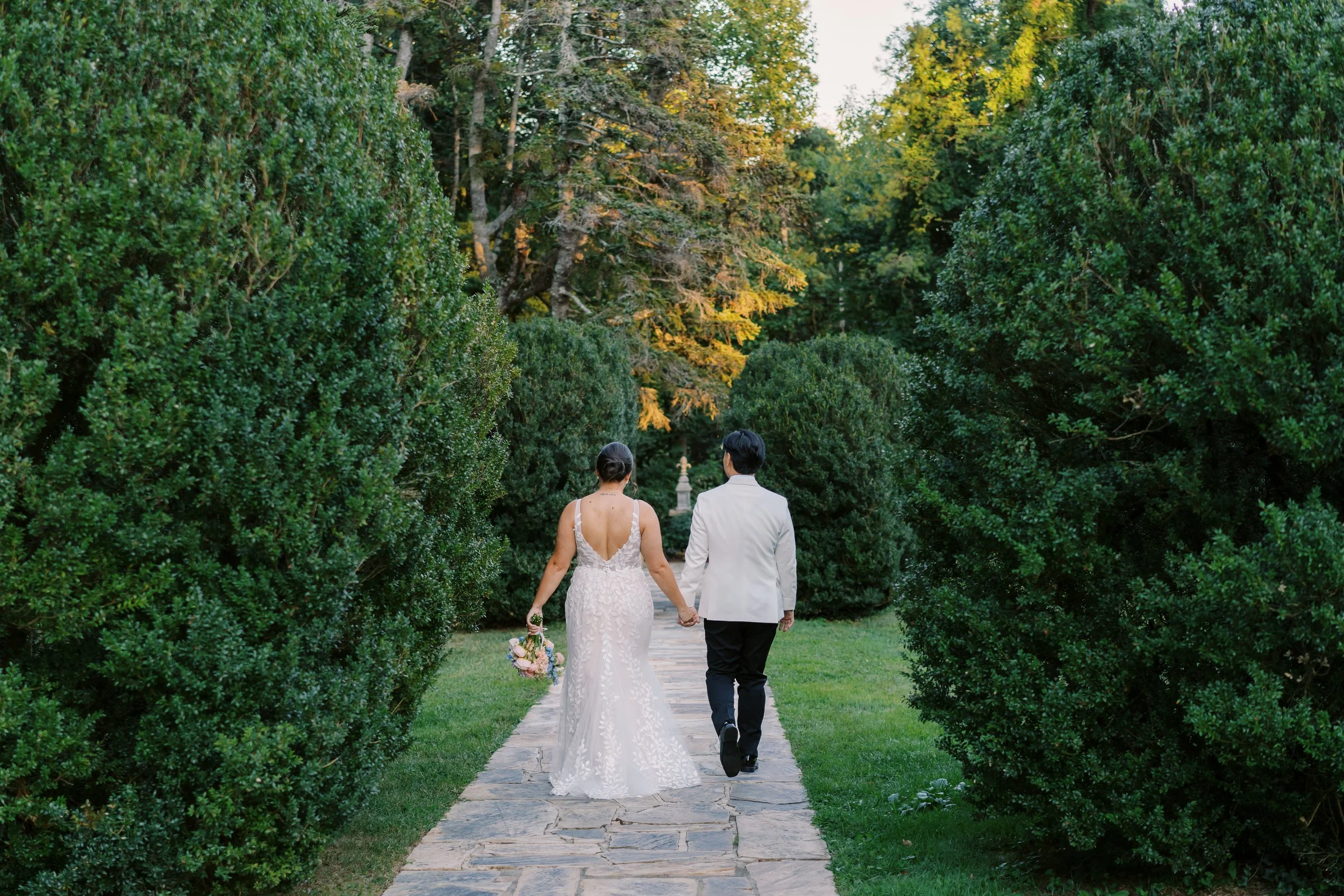 BRIDE GROOM GARDEN WALK COLORFUL BRIDAL BOUQUET RUST MANOR HOUSE