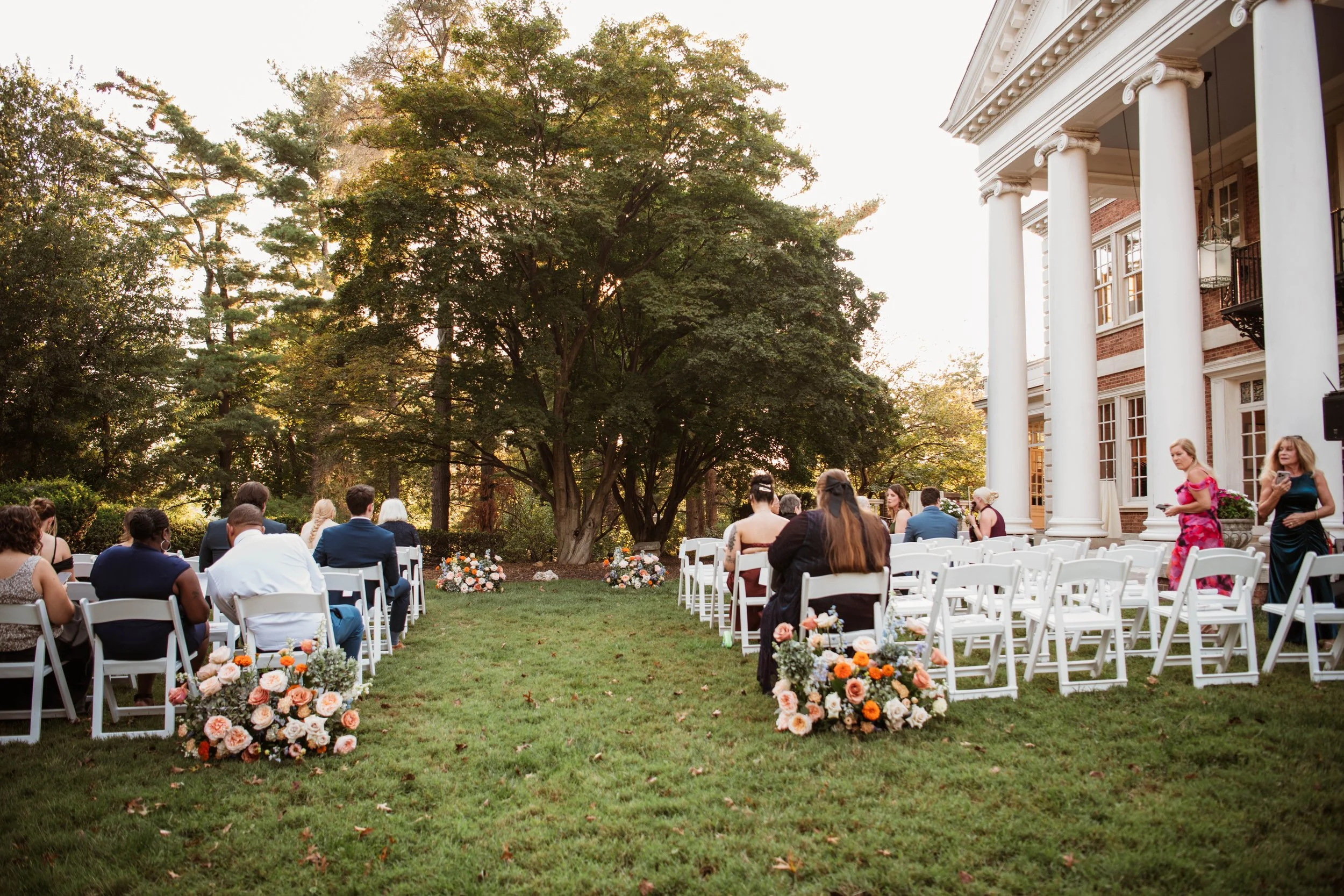 wedding ceremony aisle decor floral flower arrangement mansion at strathmore bethesda maryland