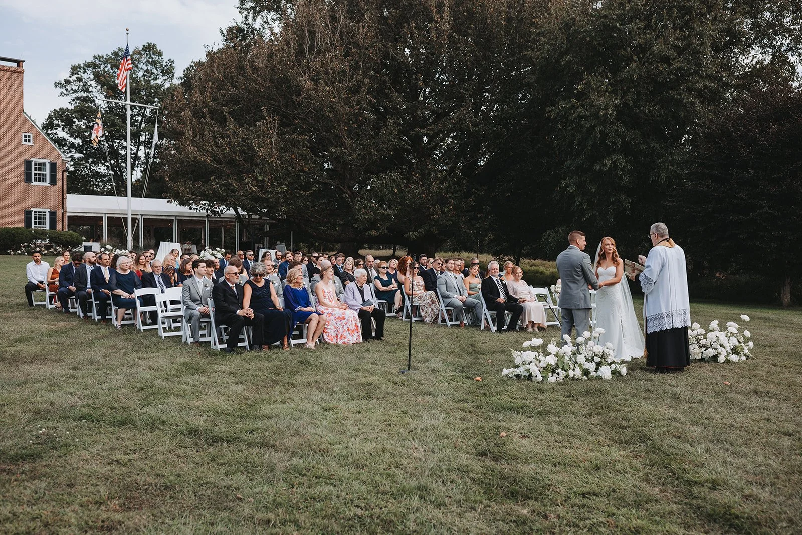 bride groom ground flowers floral arrangement aisle catholic wedding ceremony bohemia manor farm chesapeake city maryland