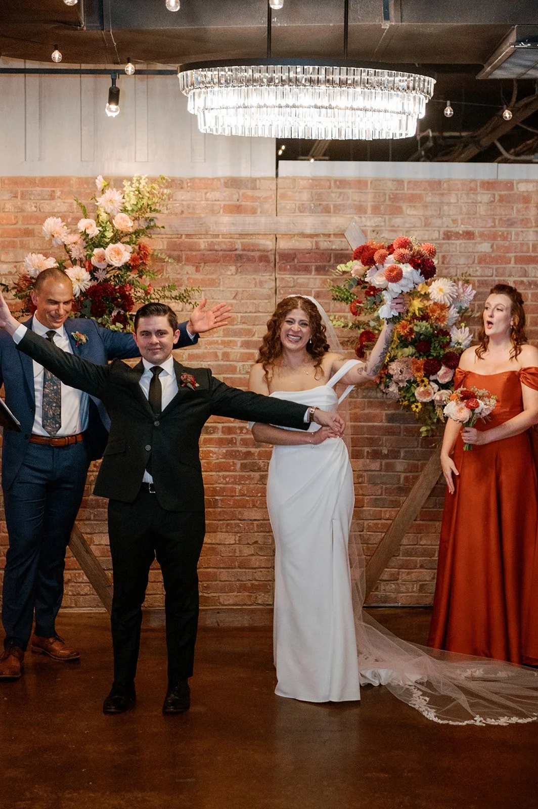 bride groom flower floral arrangement wedding arch autumn main street ballroom ellicott city maryland