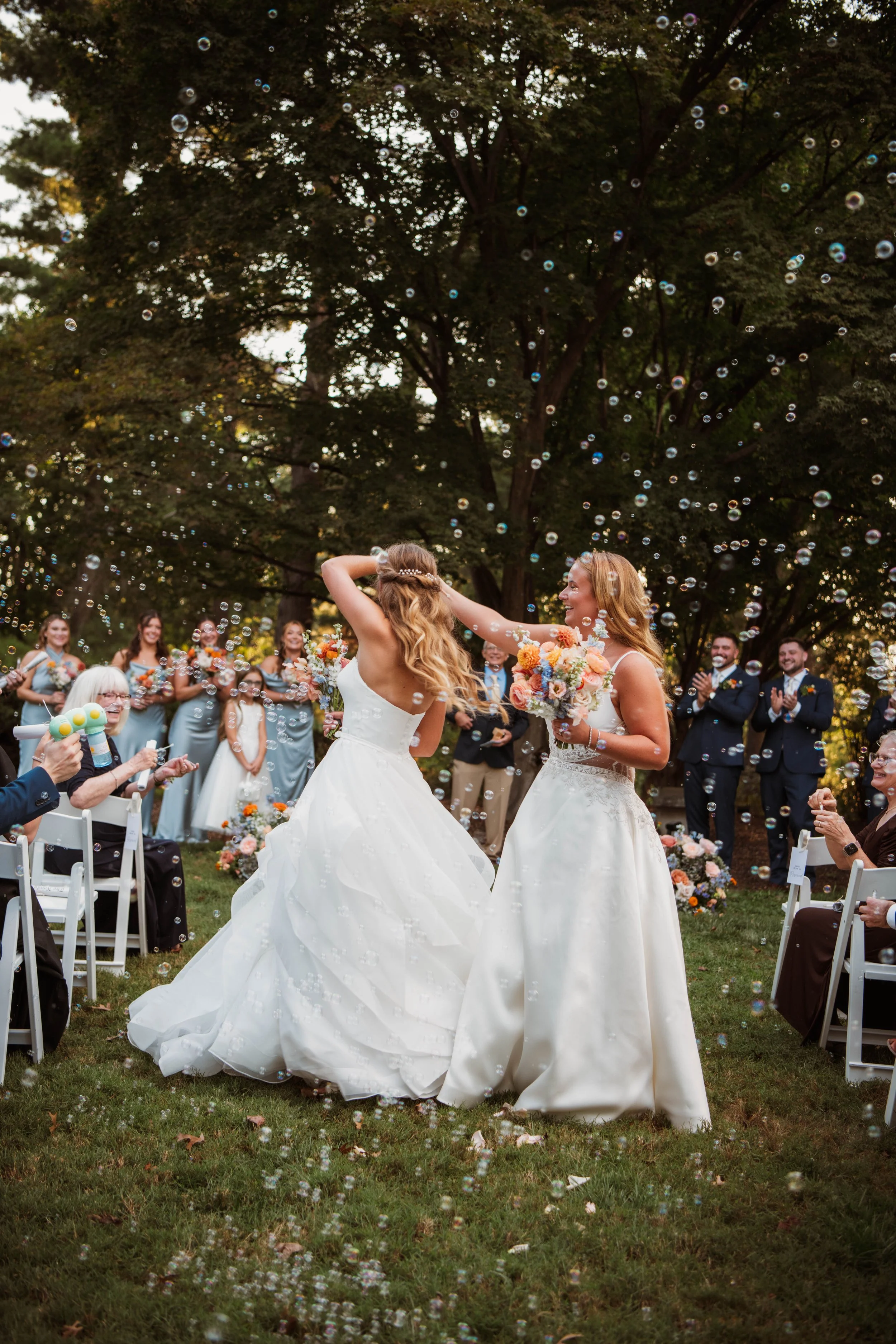 bride wedding ceremony bubbles decor floral flower arrangement mansion at strathmore bethesda maryland