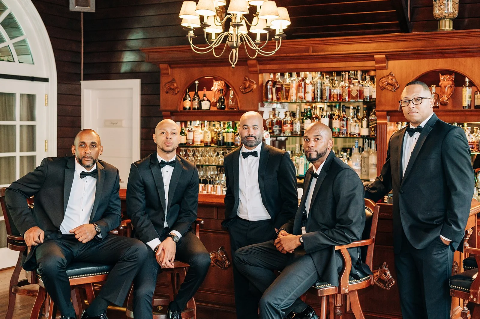 groom groomsmen tuxedo bar wedding editorial