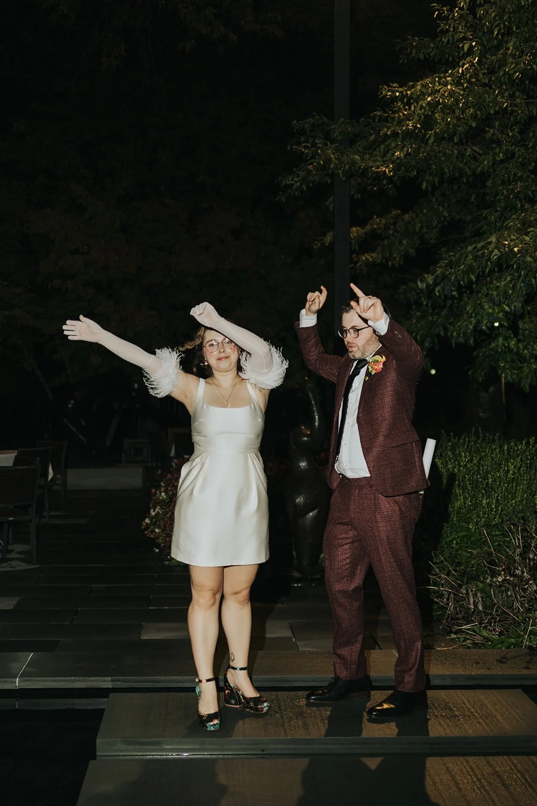 BRIDE GROOM WEDDING RECEPTION DANCING RAIN BALTIMORE MARYLAND MUSEUM ART