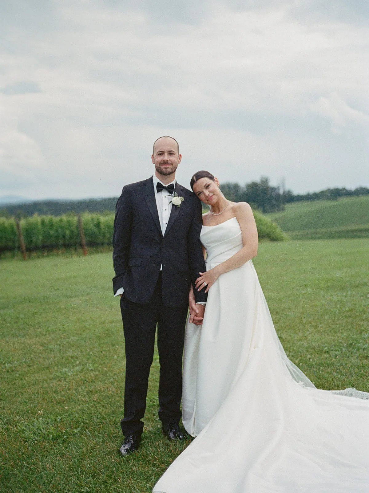 BRIDE GROOM WEDDING CEREMONY OUTDOOR FIELD STONE TOWER WINERY VENUE