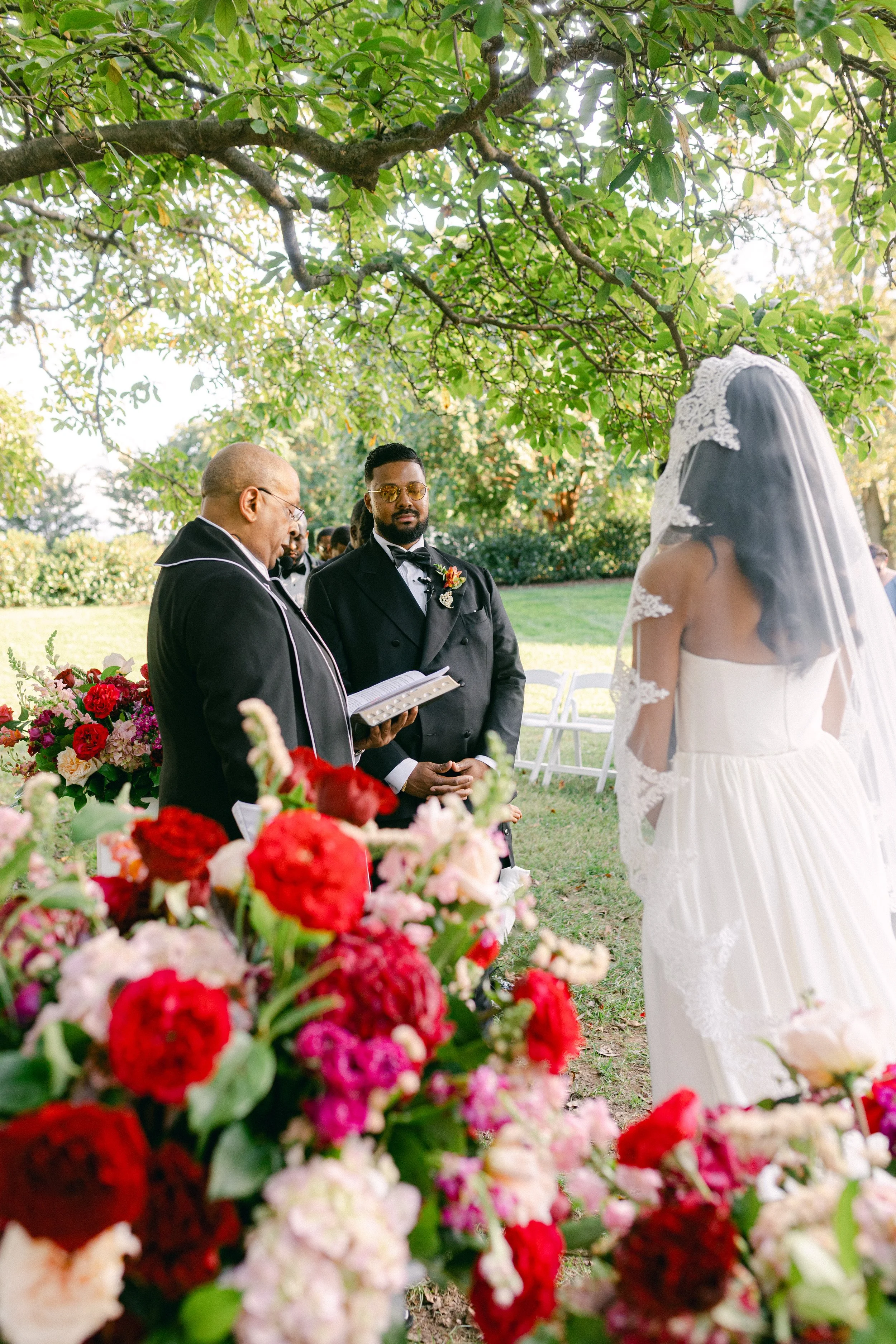 bride groom floral flower arrangement pedestal wedding ceremony belmont manor historic park elkridge maryland
