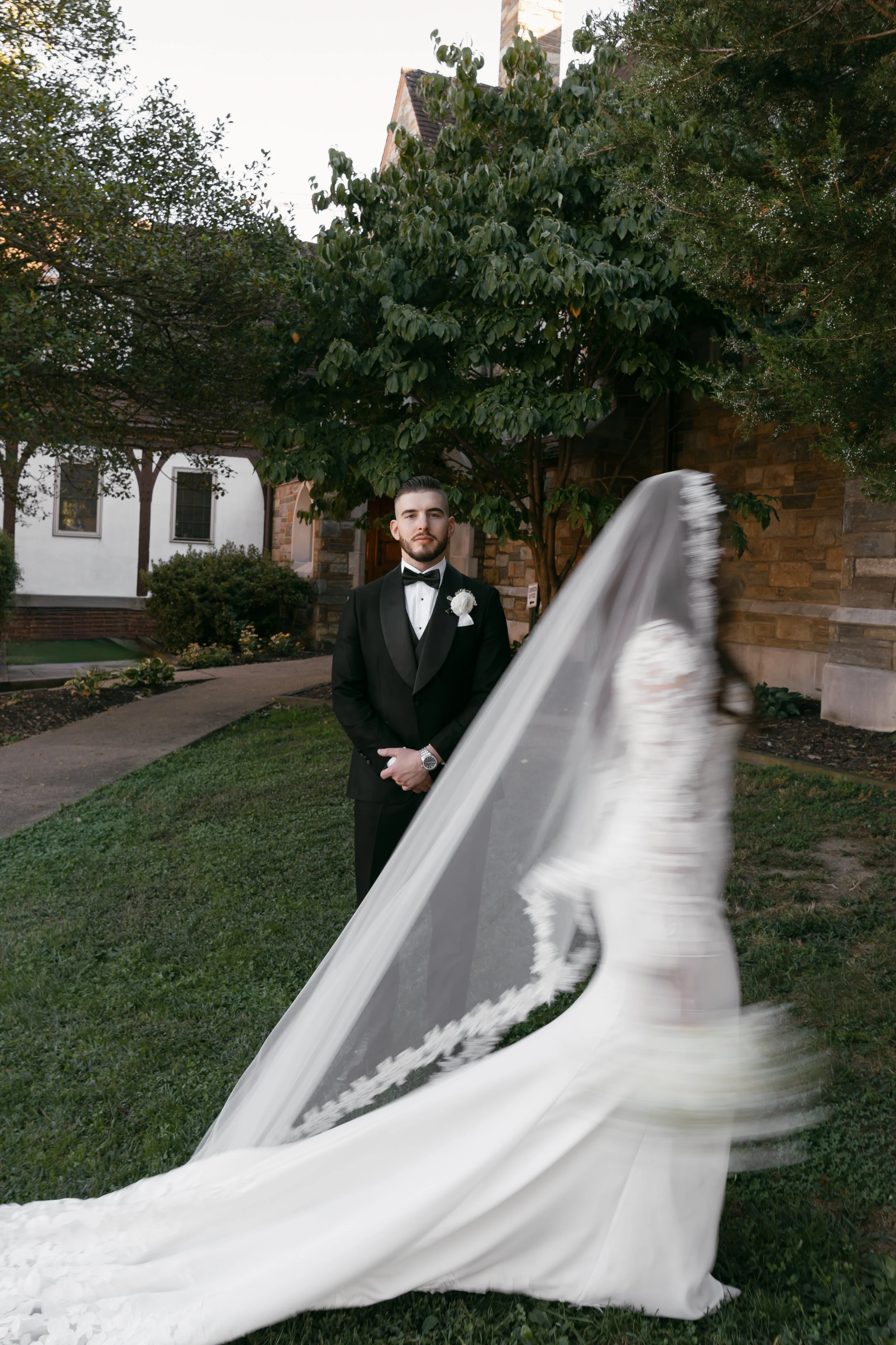 BRIDE GROOM WEDDING CHURCH TUXEDO GOWN EDITORIAL PORTRAIT